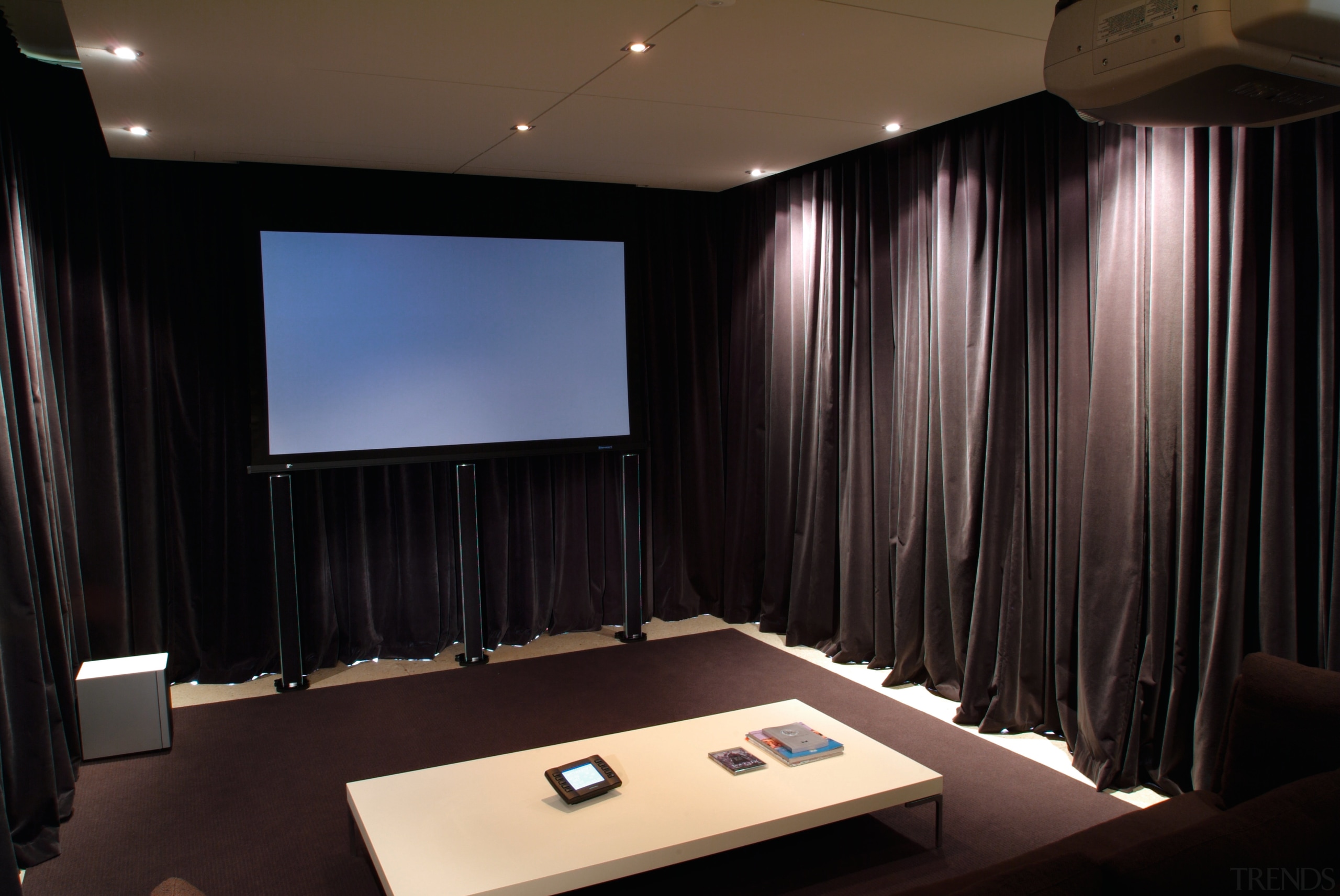 view of the home theatre area with motorised auditorium, ceiling, conference hall, display device, interior design, lighting, projection screen, room, black