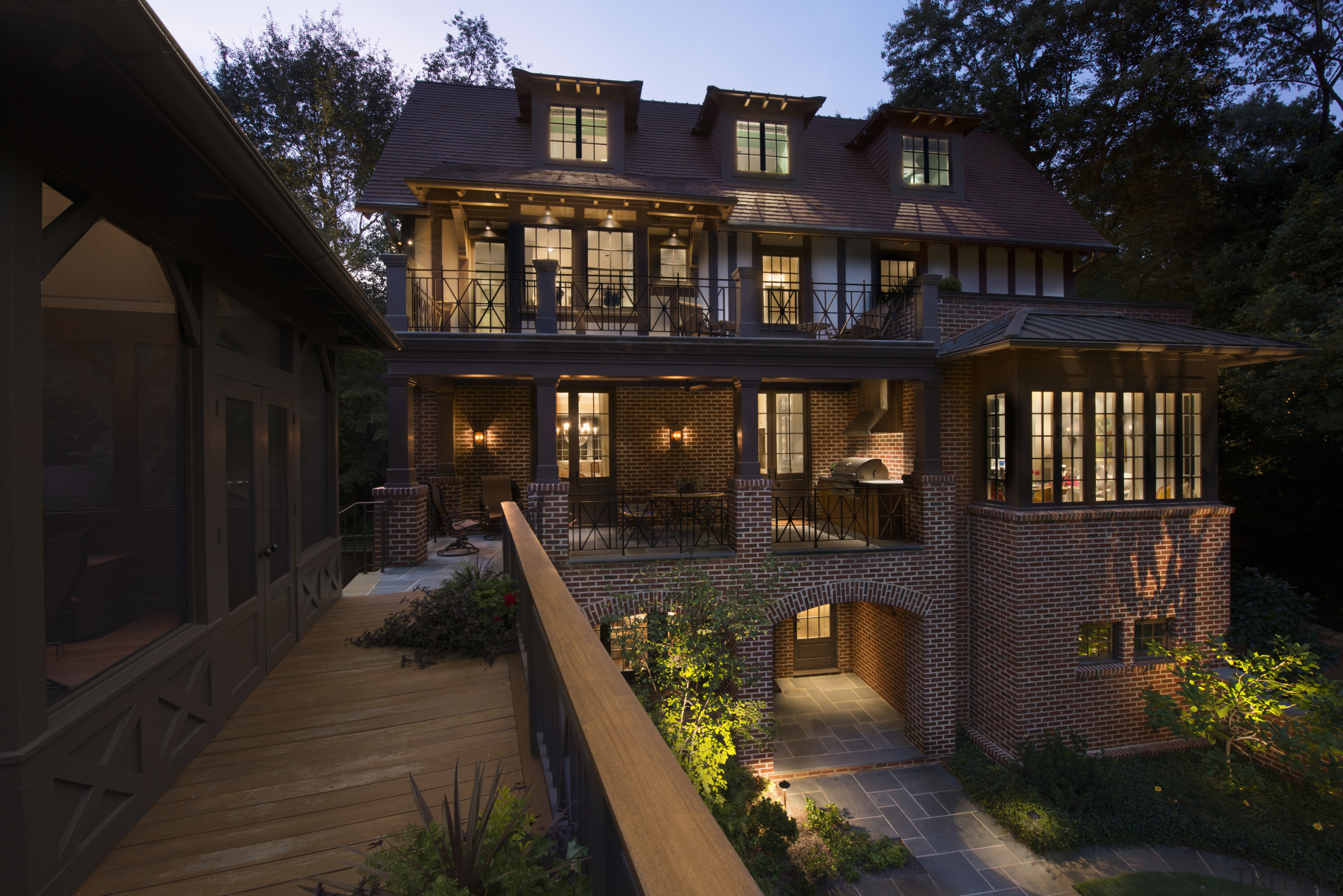 At the rear, the new basement terrace level cottage, estate, facade, historic house, home, house, landscape lighting, lighting, mansion, outdoor structure, property, real estate, residential area, siding, window, black