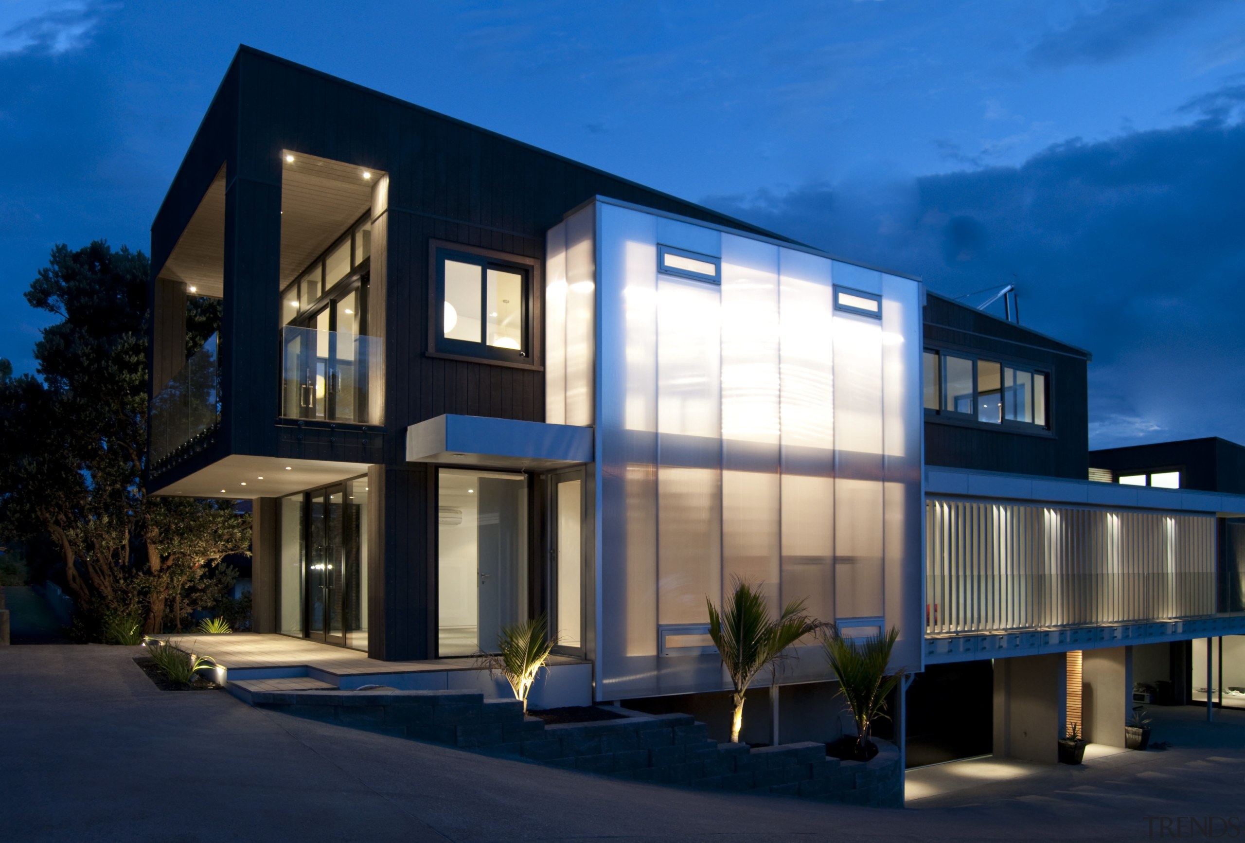 View of the Lite-House on Waiheke Island, a apartment, architecture, building, commercial building, condominium, corporate headquarters, elevation, estate, facade, home, house, mixed use, property, real estate, residential area, sky, window, blue