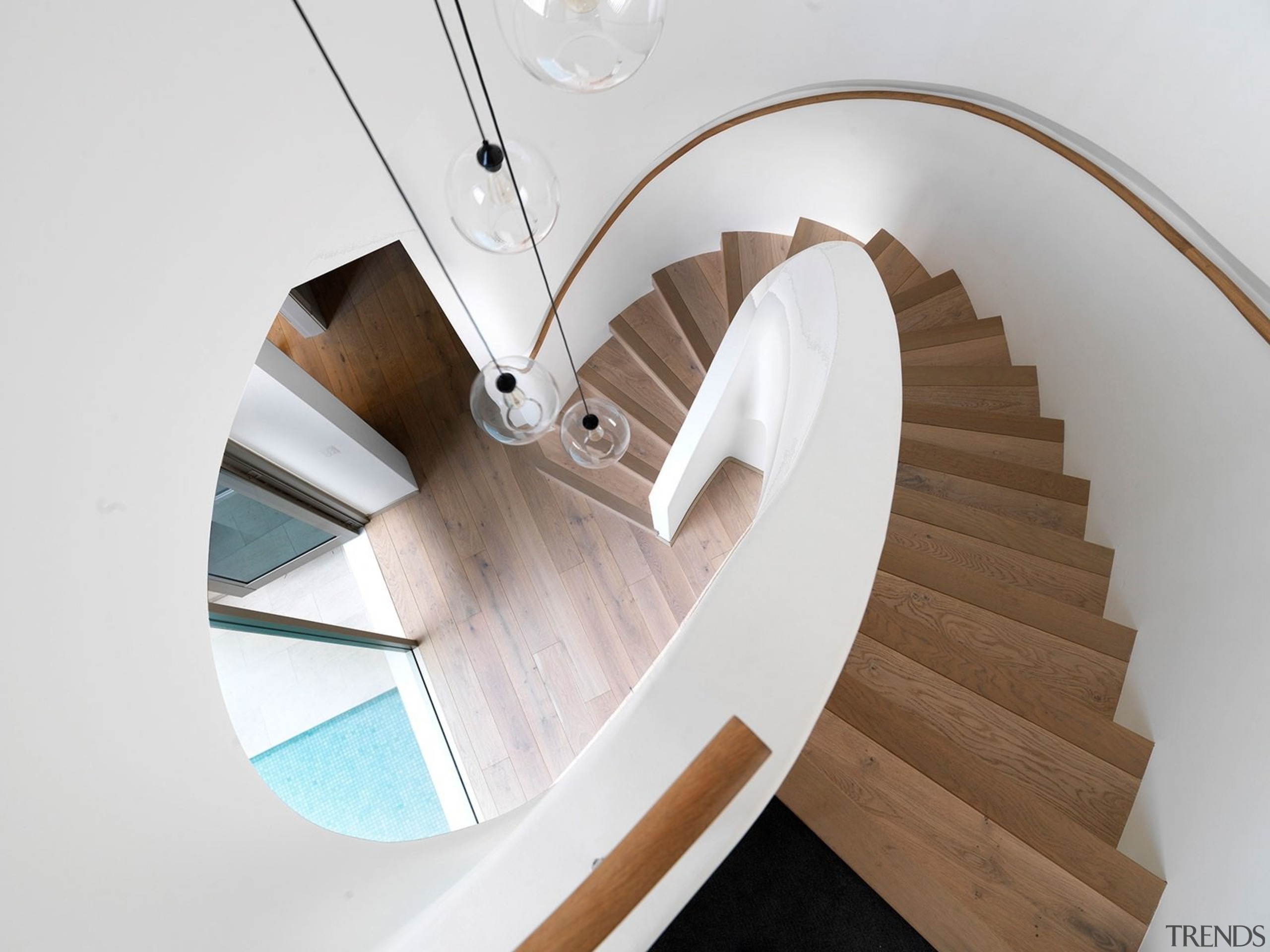 The elliptical stair has ‘balanced treads’, each tread furniture, product design, stairs, table, wood, white