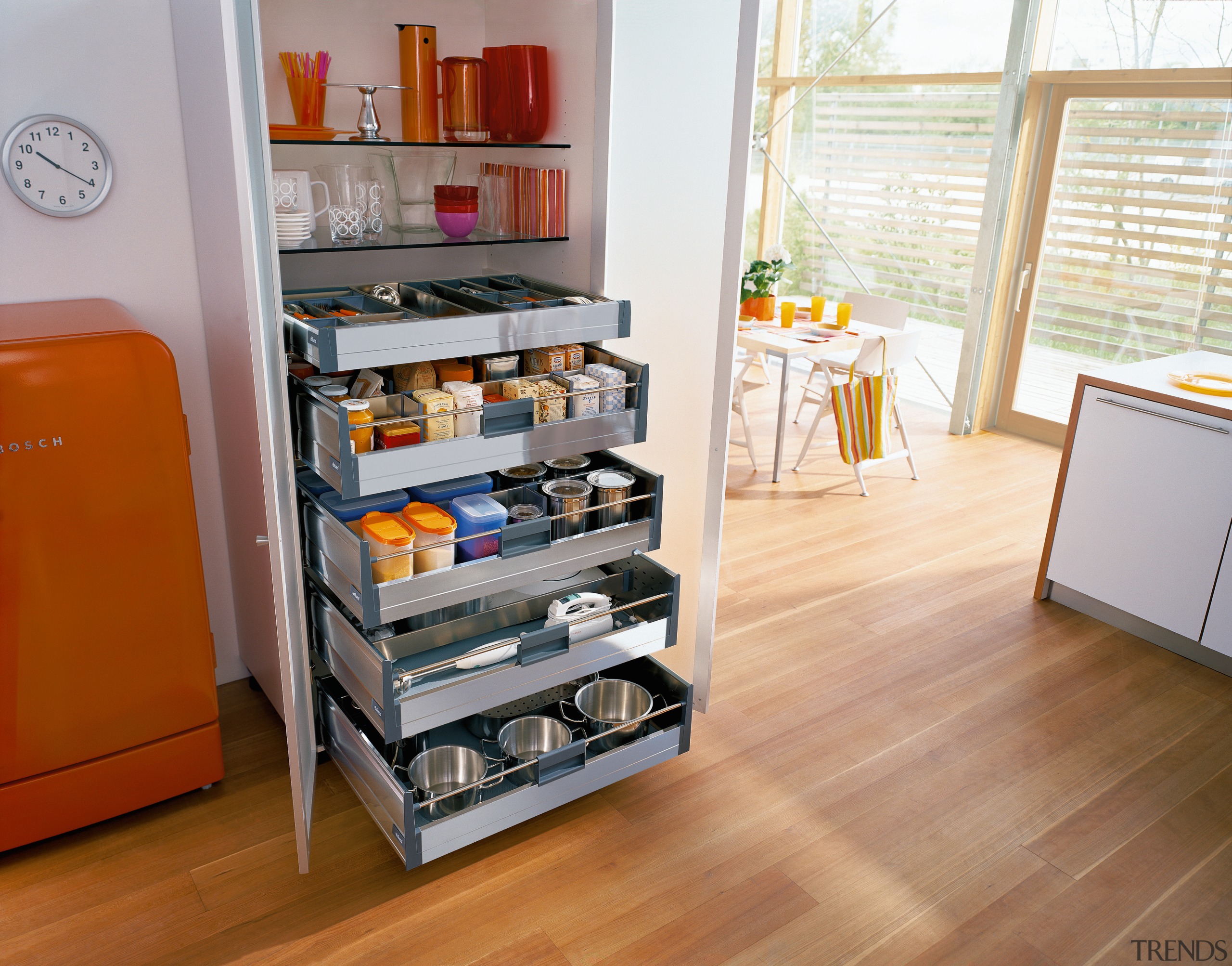 View of kitchen pantry with full extension drawers. chest of drawers, drawer, floor, flooring, furniture, hardwood, kitchen, pantry, product, shelf, shelving, white, brown