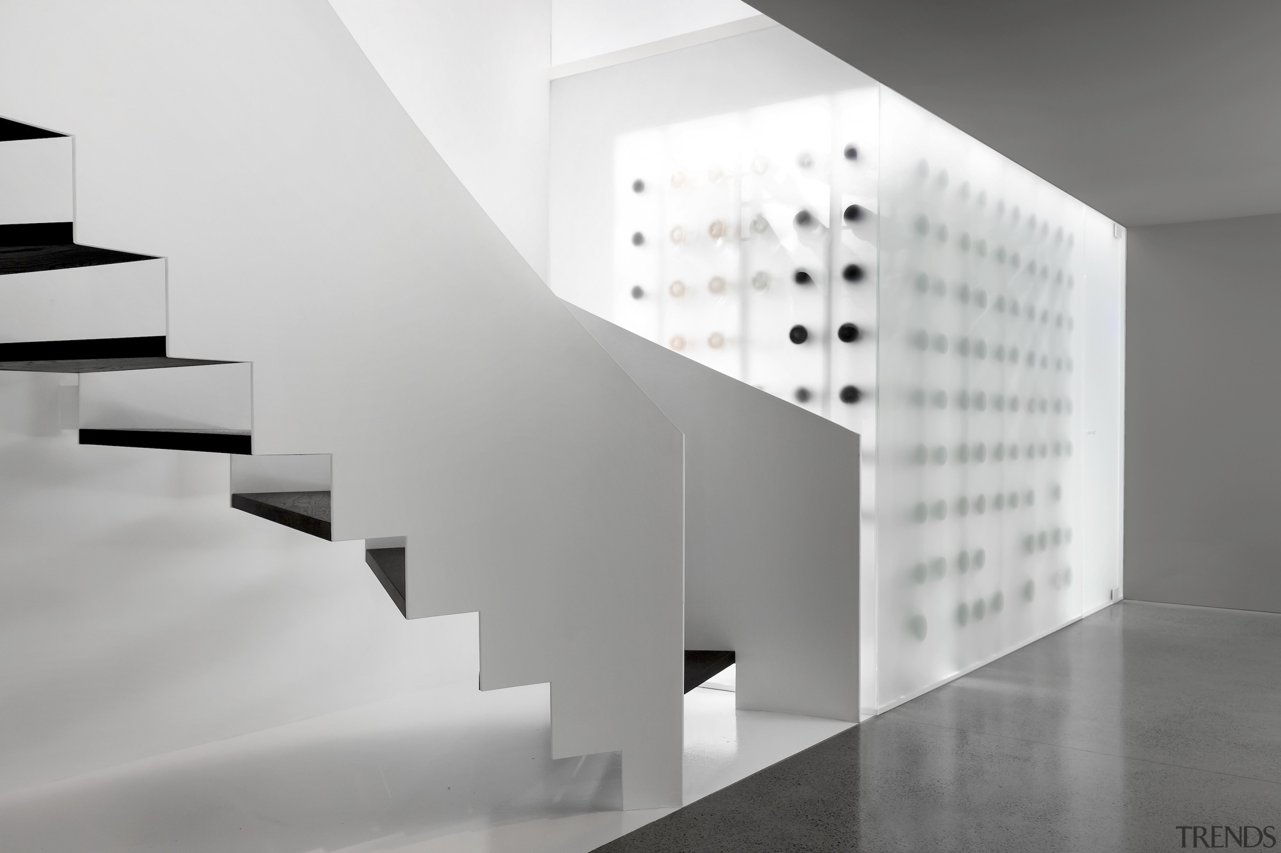 Thin, carved partitions curve around and envelop the 