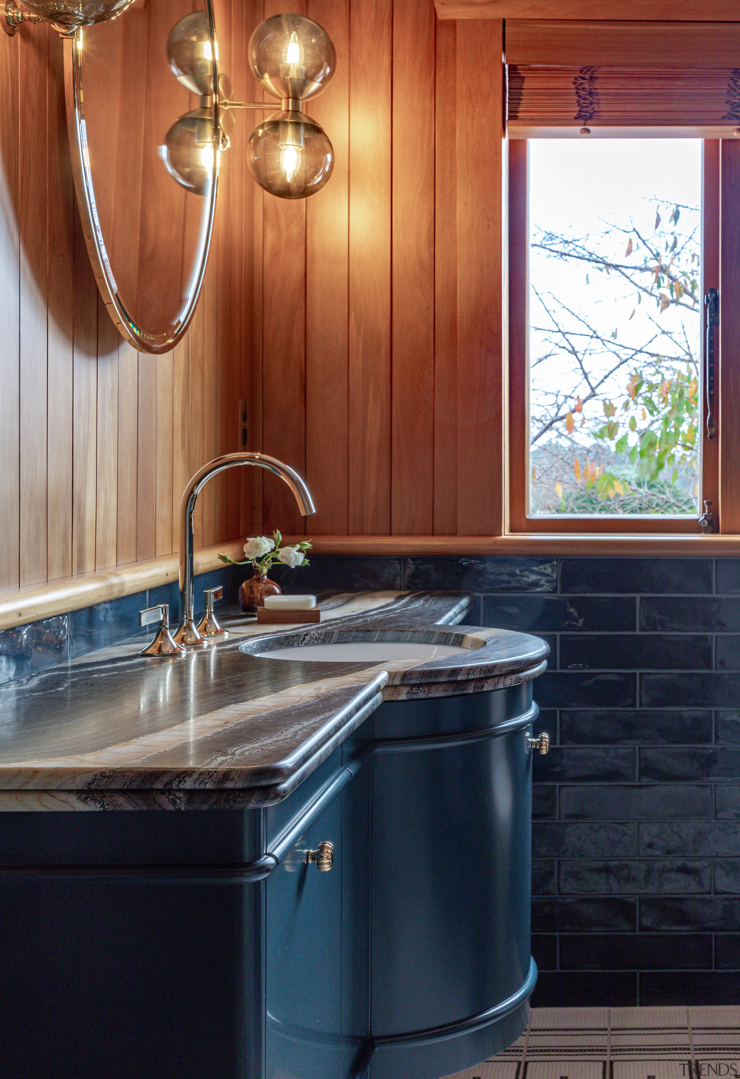 Timber blinds complement the upper wall finish. 