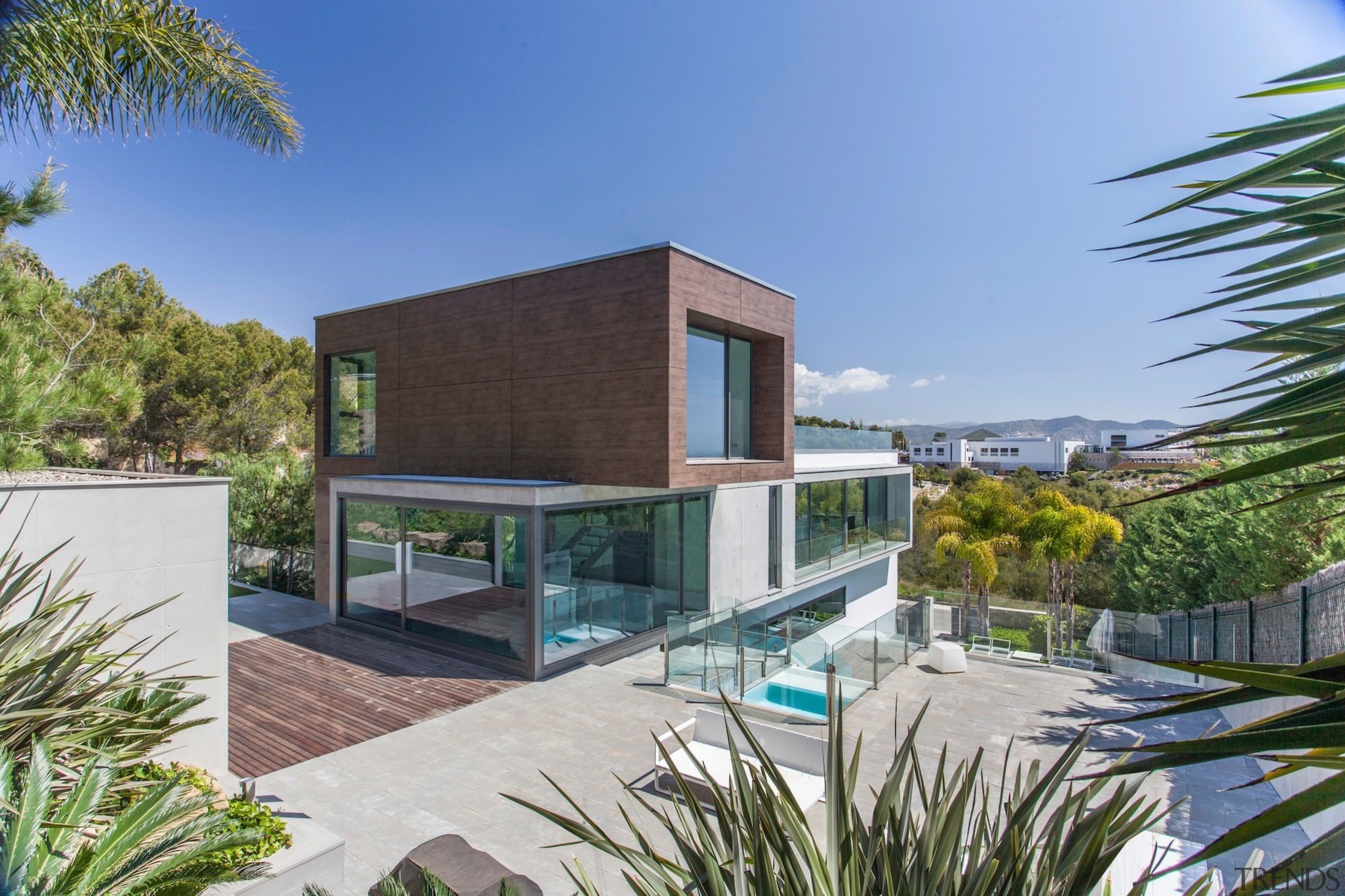 This block sits atop the main living area architecture, condominium, estate, facade, home, house, property, real estate, residential area, swimming pool, villa, gray, teal