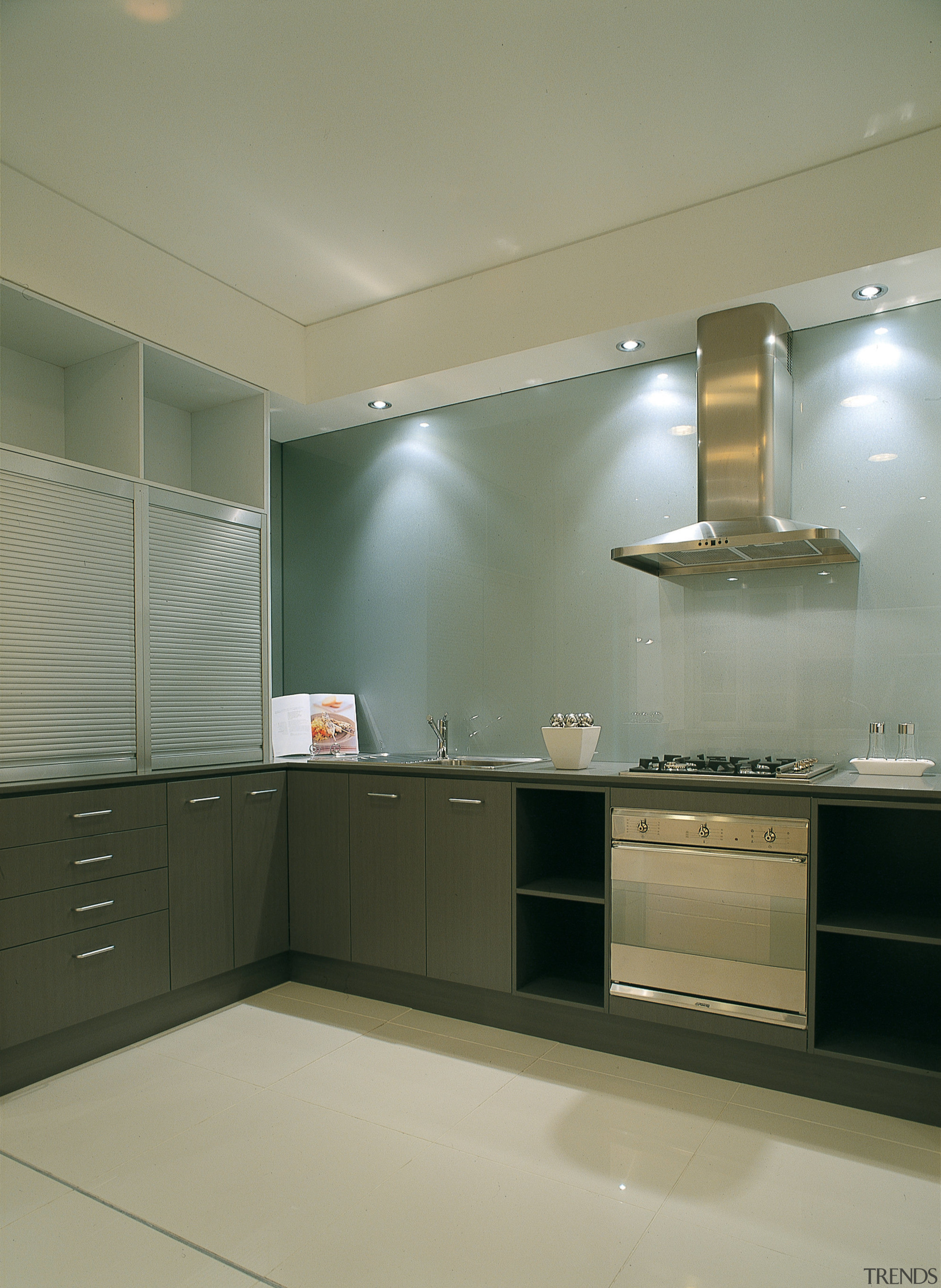 A view of a kitchen, white tile dfloor, cabinetry, ceiling, countertop, floor, interior design, kitchen, room, yellow