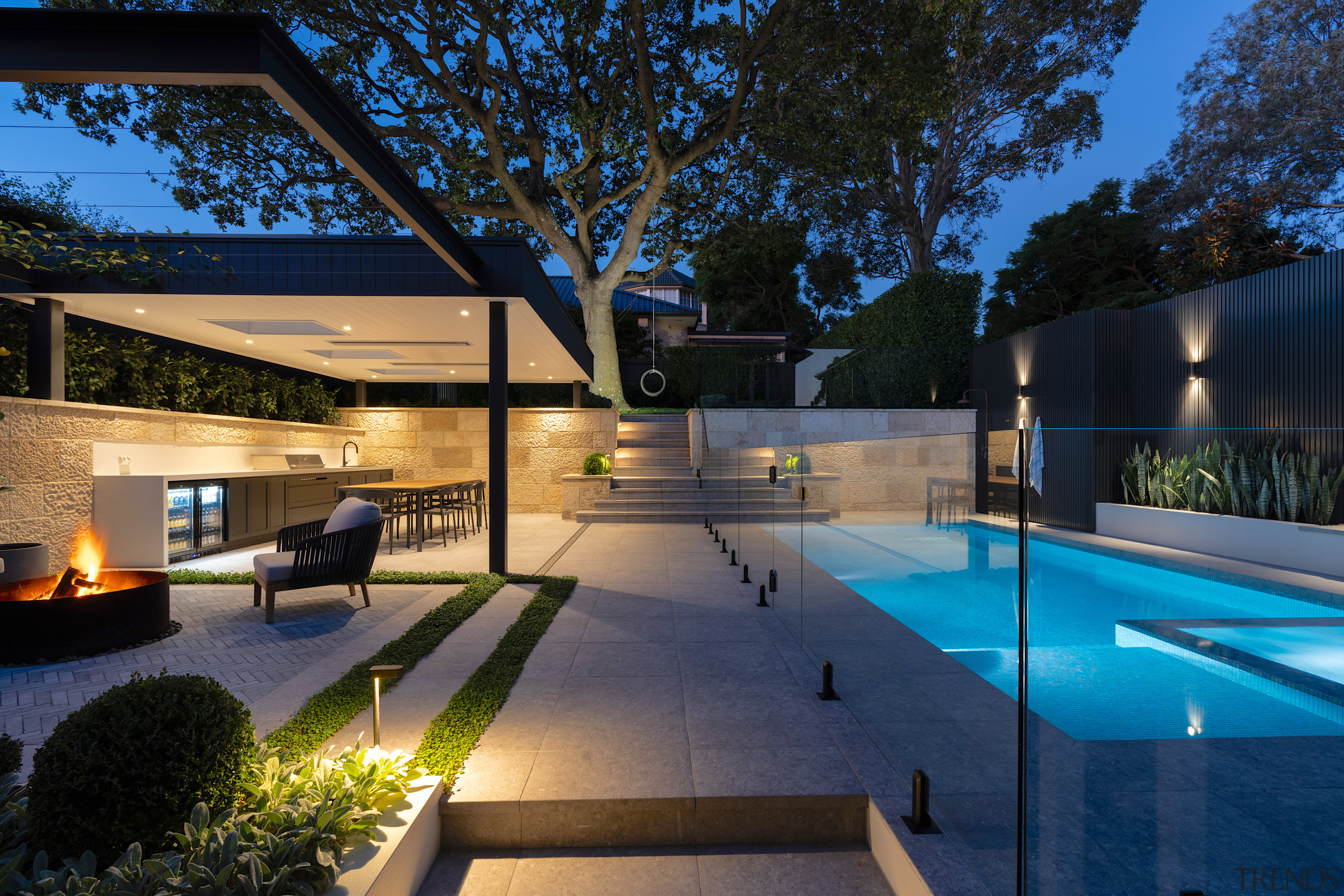 The project at night with pool internally lit 