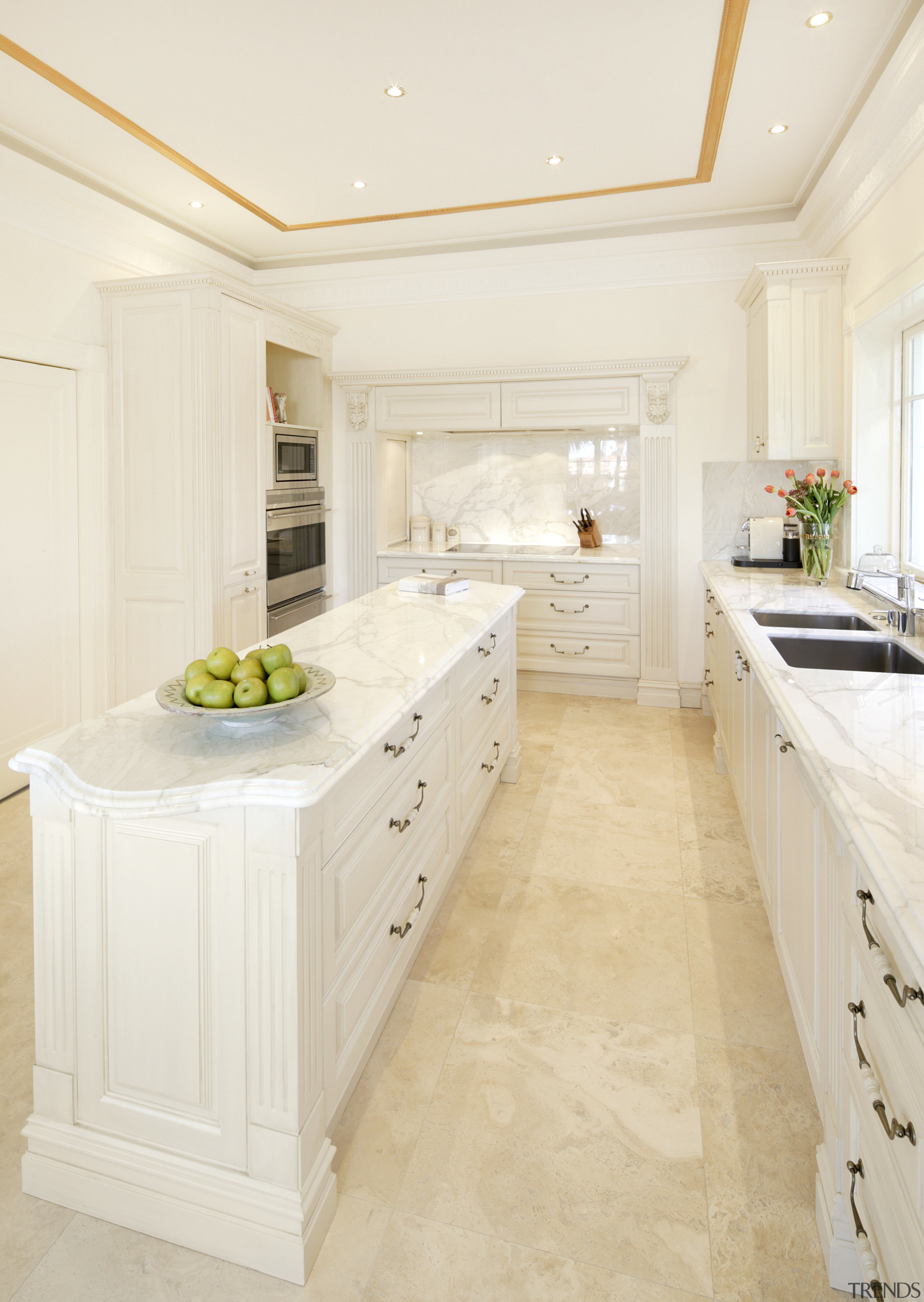 View of kitchen with cream and white colour cabinetry, countertop, cuisine classique, floor, flooring, home, interior design, kitchen, room, tile, wood flooring, white