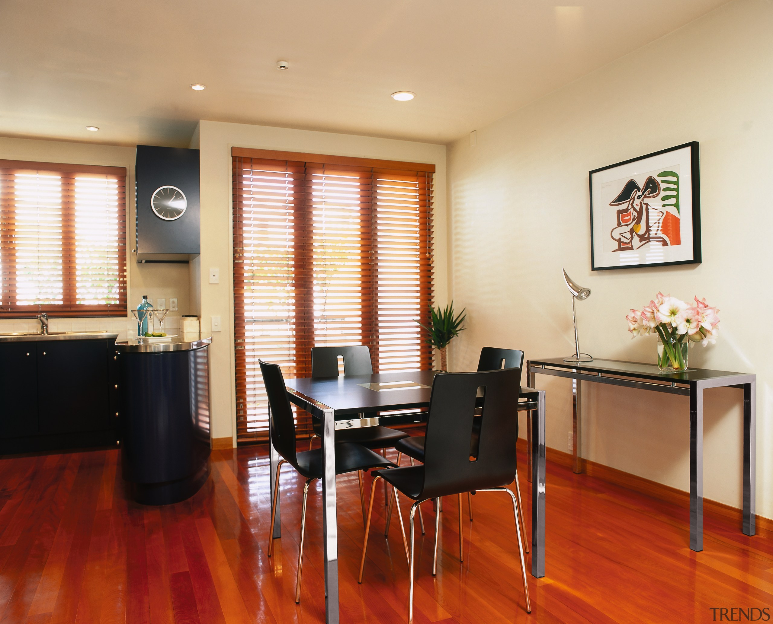 Square black and chrome dining table with matching ceiling, dining room, floor, flooring, hardwood, interior design, living room, property, real estate, room, table, wood flooring, orange