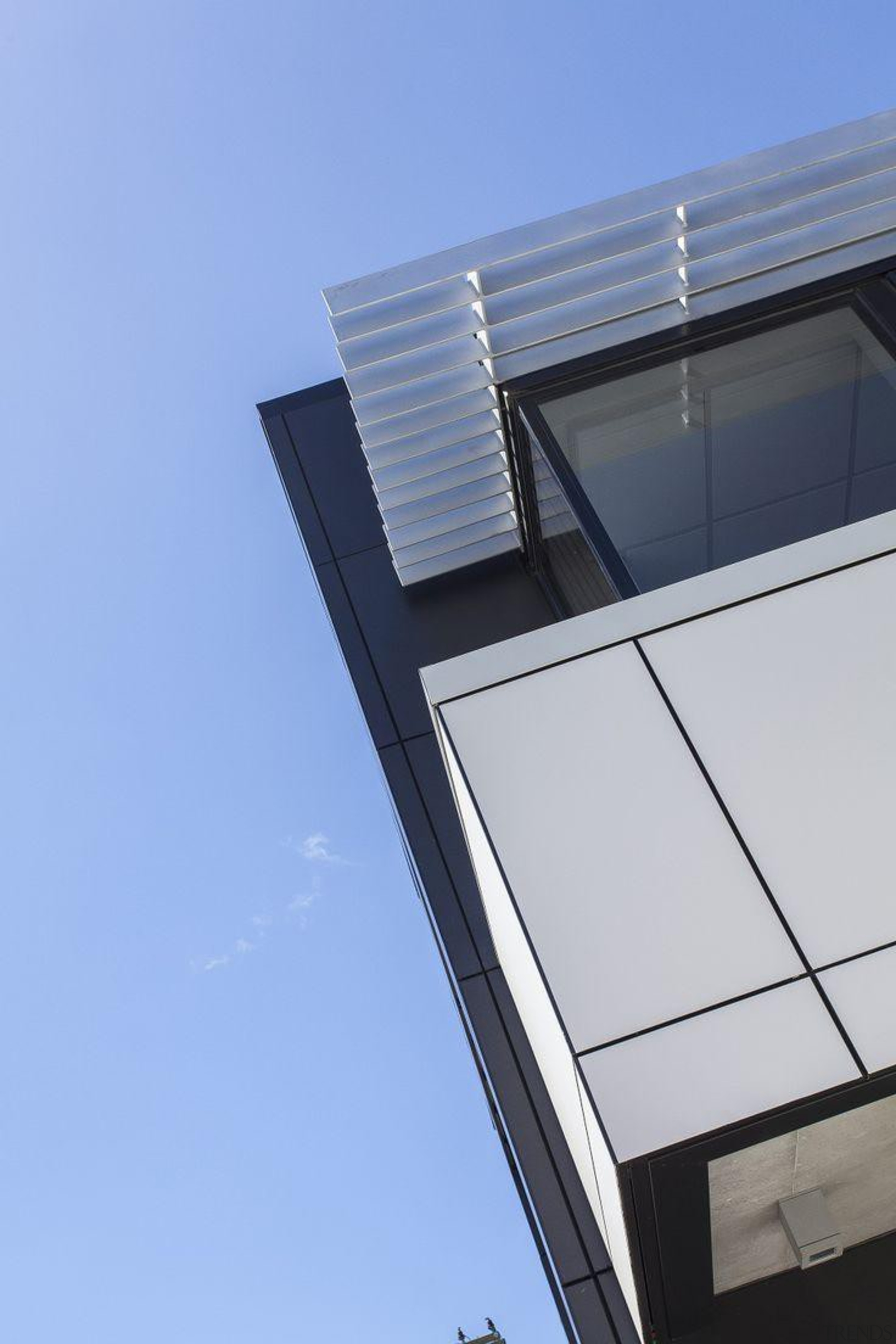 Foley Architects Building, Christchurch, New Zealand. Black cladding architecture, building, cloud, commercial building, corporate headquarters, daylighting, daytime, facade, glass, house, line, sky, window, teal
