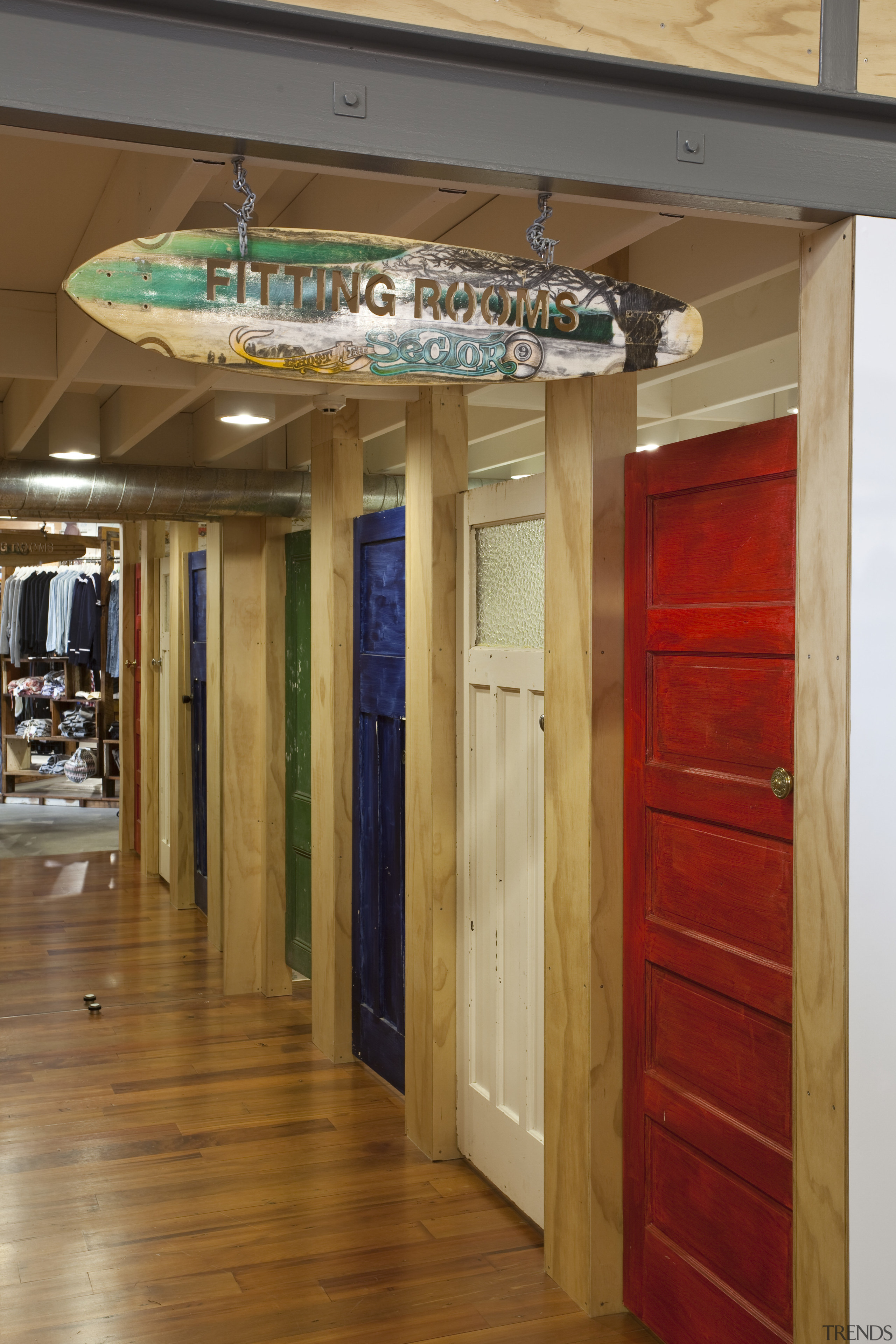 View of retail shop with interior and exterior ceiling, door, floor, flooring, interior design, wood, brown