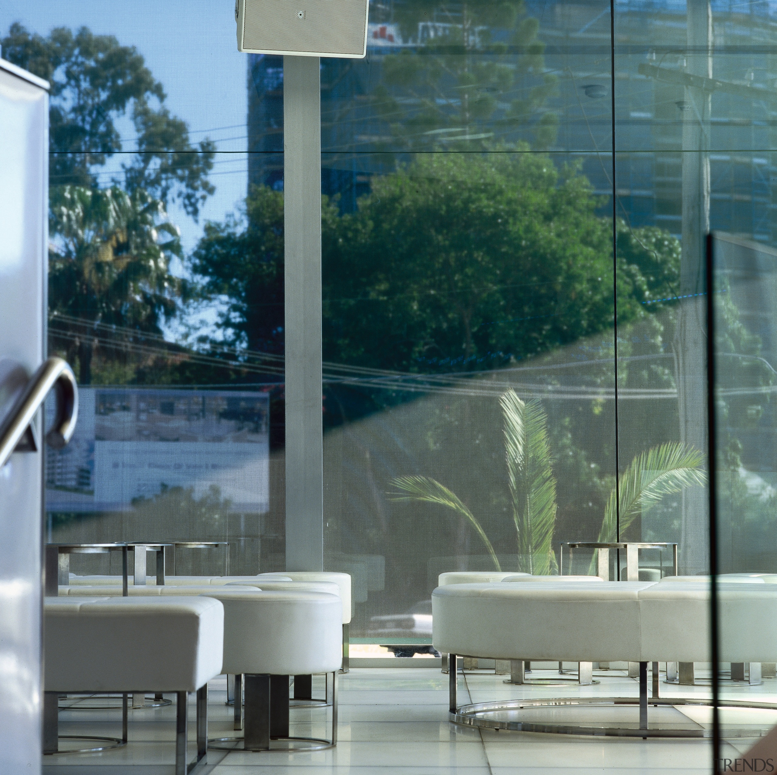 Lobby seating area with large windows. - Lobby architecture, furniture, glass, interior design, window, gray, teal