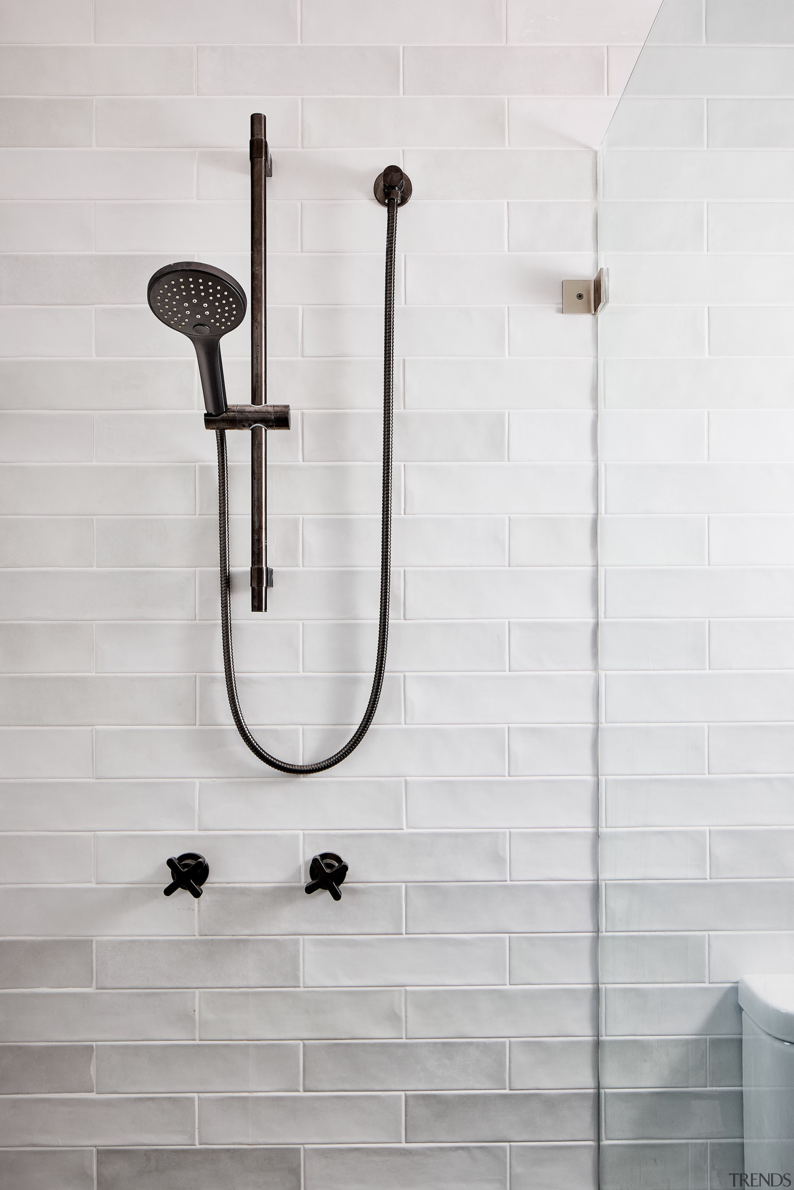 The contrast of glazed white tiles and black 