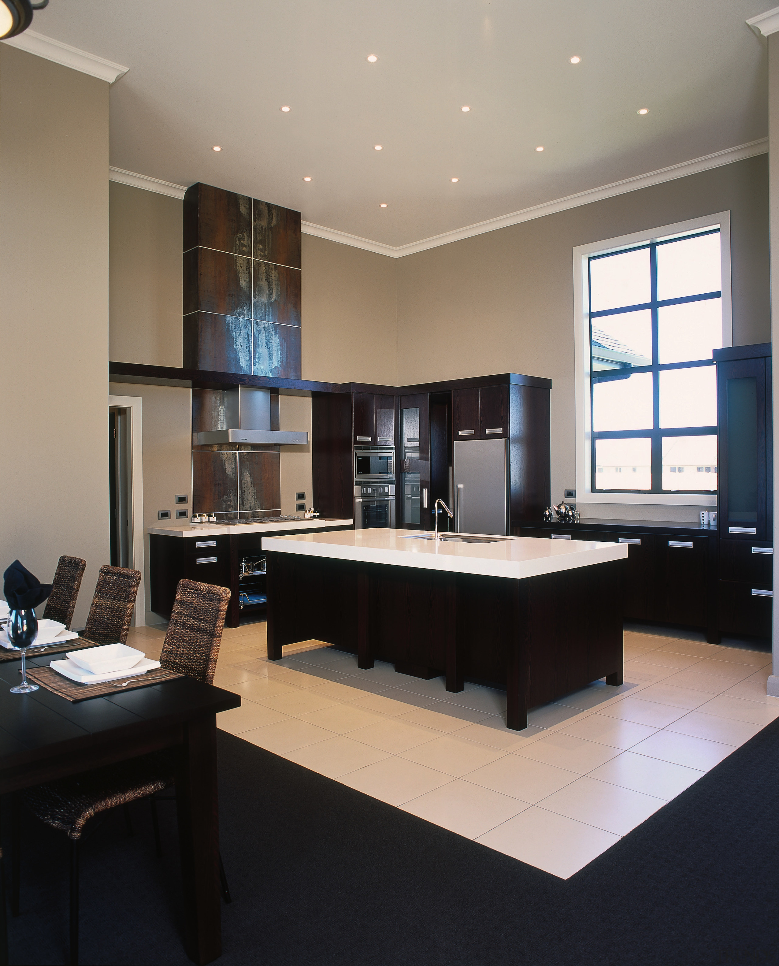 Kitchen with wenge timber cabinetry and thick Stonex ceiling, floor, flooring, furniture, interior design, living room, real estate, room, table, gray, black