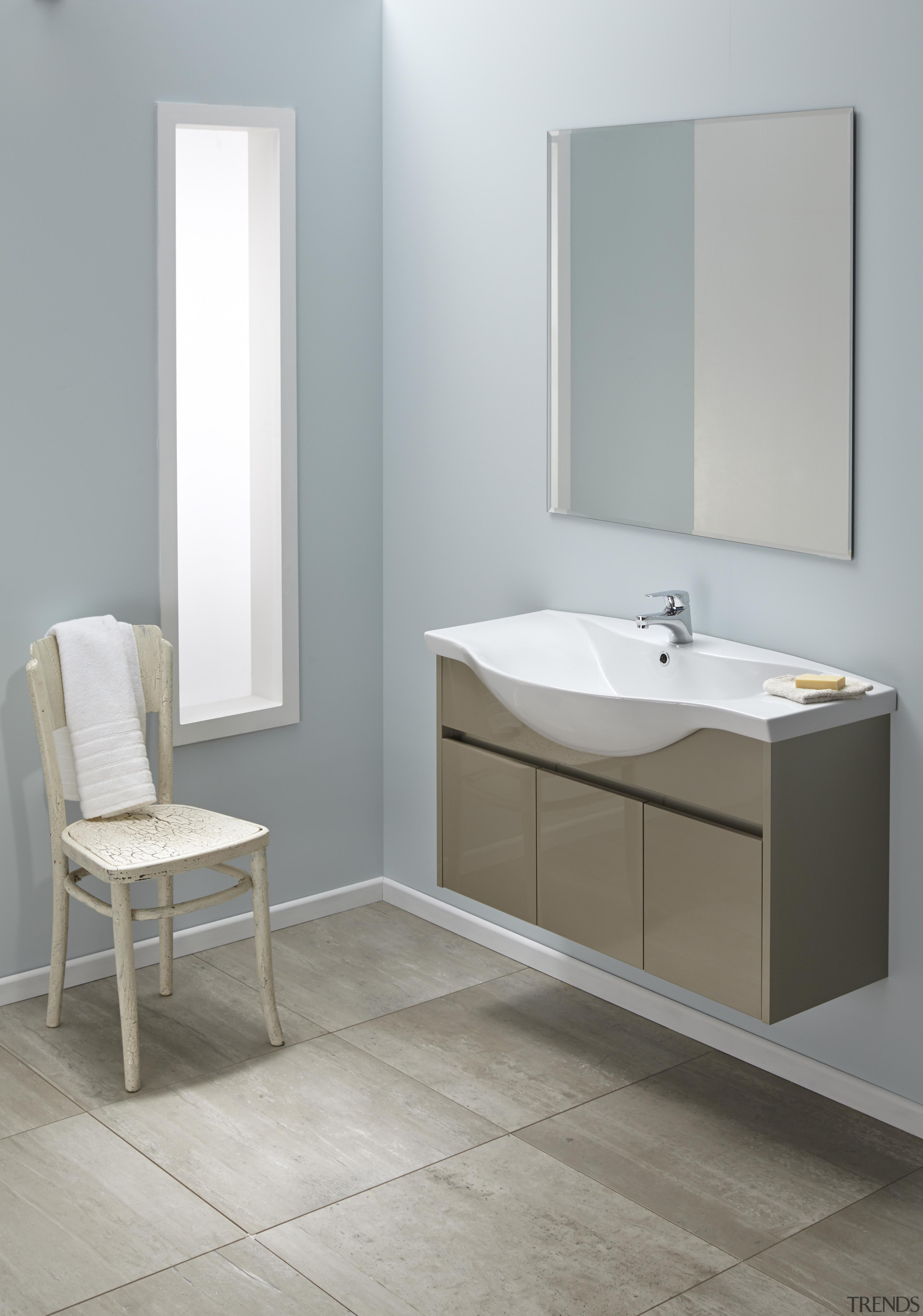 A classic style is formed when sweeping edges angle, bathroom, bathroom accessory, bathroom cabinet, bathroom sink, floor, furniture, plumbing fixture, product, product design, sink, tap, gray