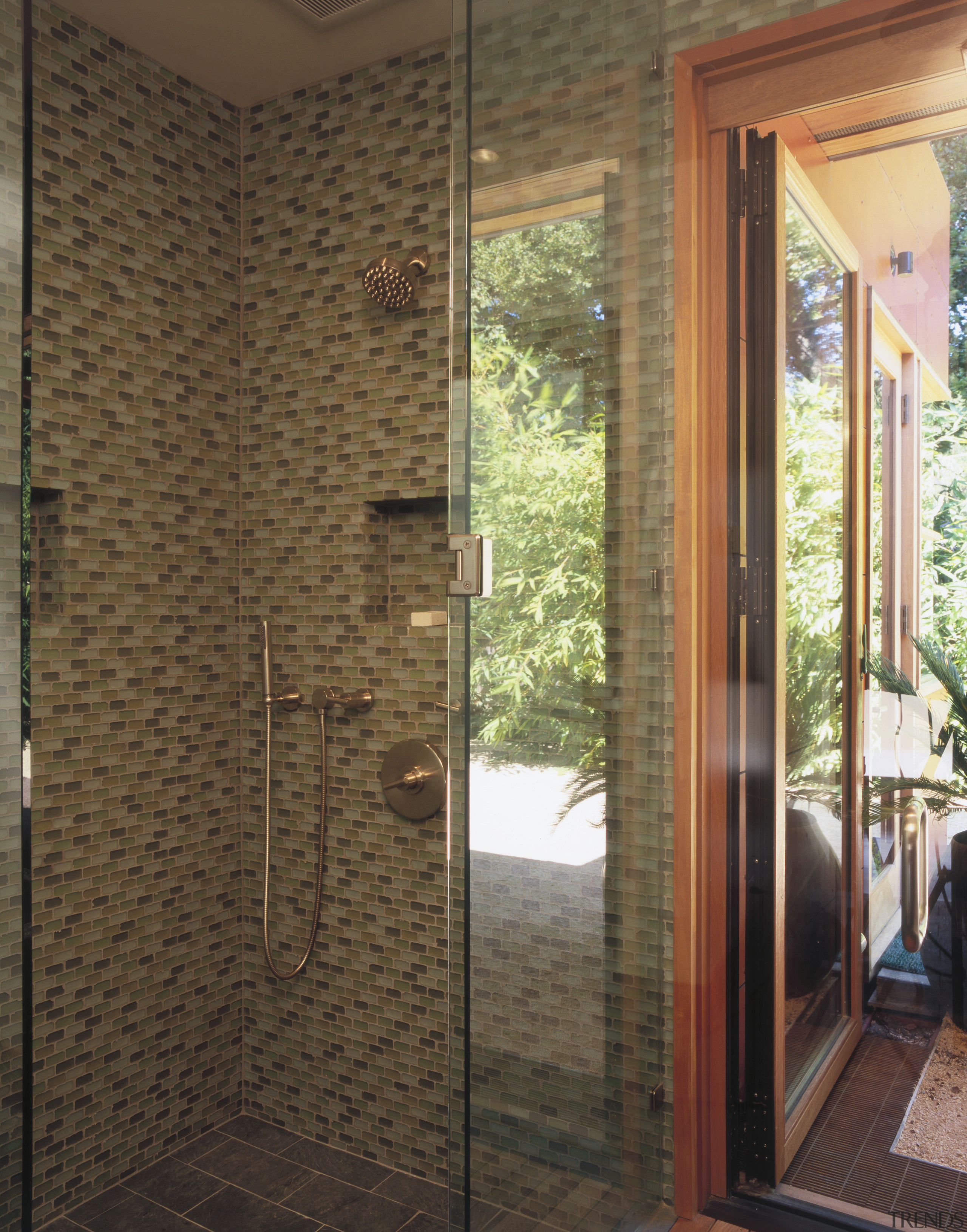 Image of a bathroom with colours that mimic bathroom, door, floor, flooring, glass, home, interior design, plumbing fixture, real estate, room, wall, window, brown