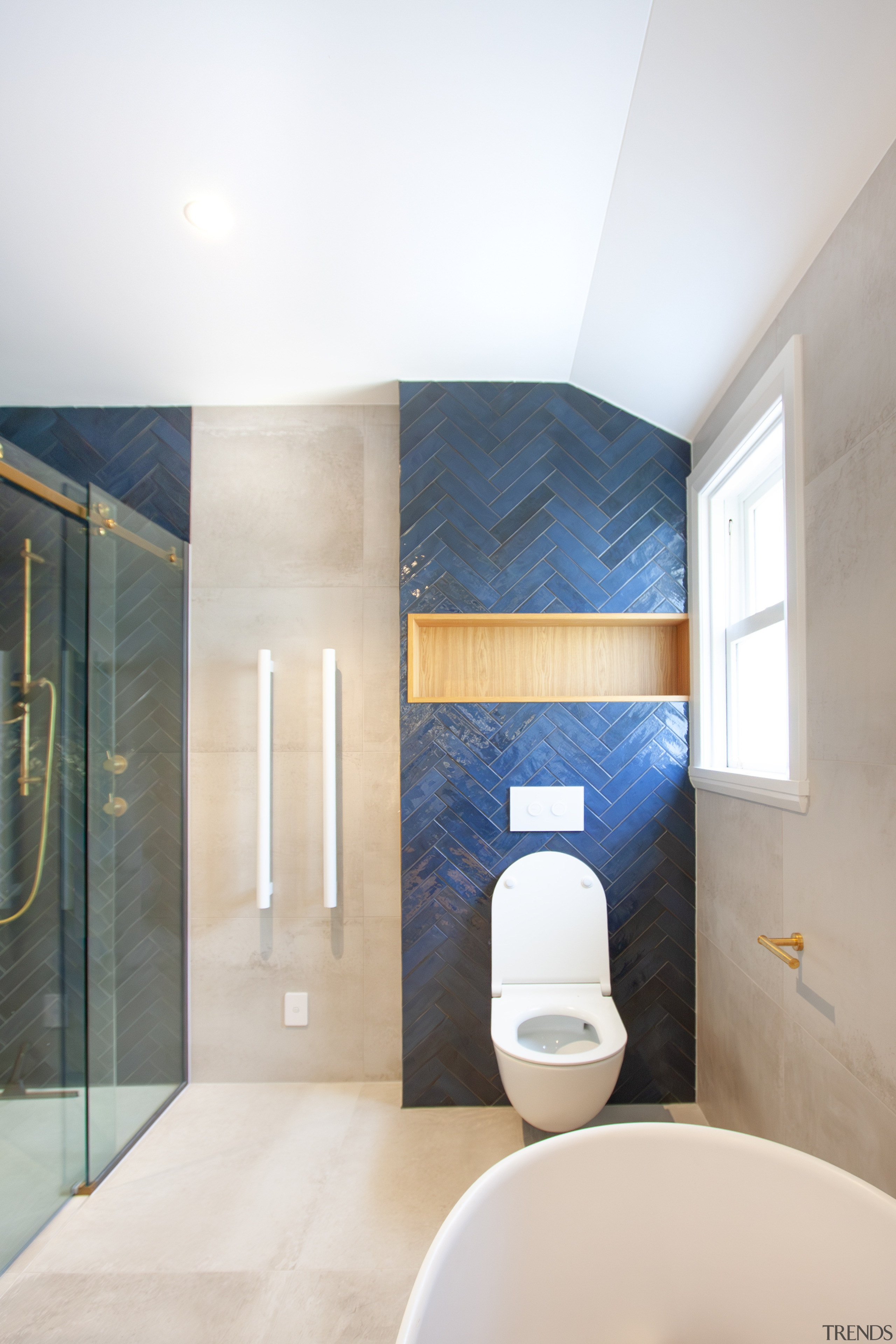 Blue tiles make a splash and contrast the 