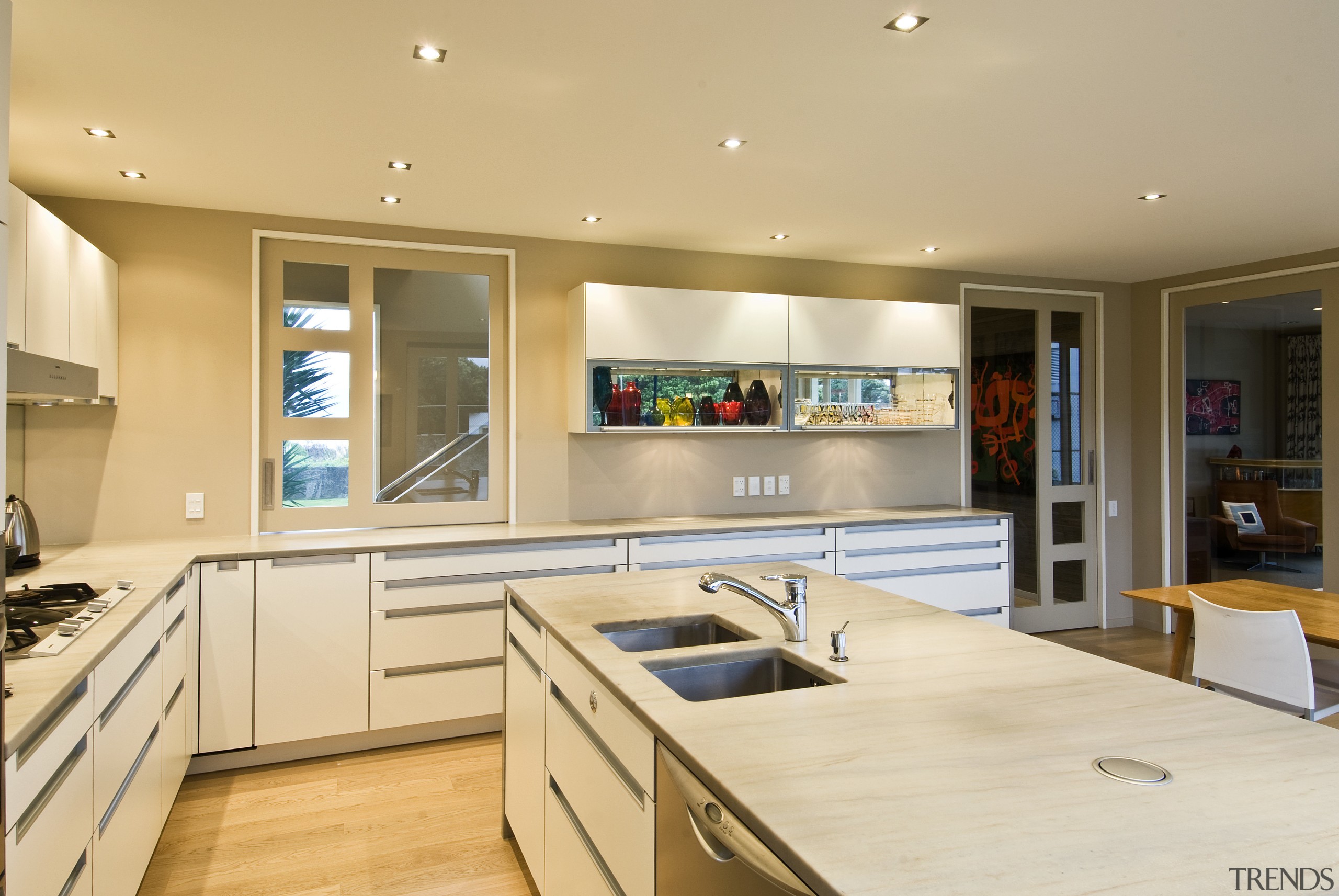 View of kitchen which has been designed by countertop, interior design, kitchen, real estate, room, orange