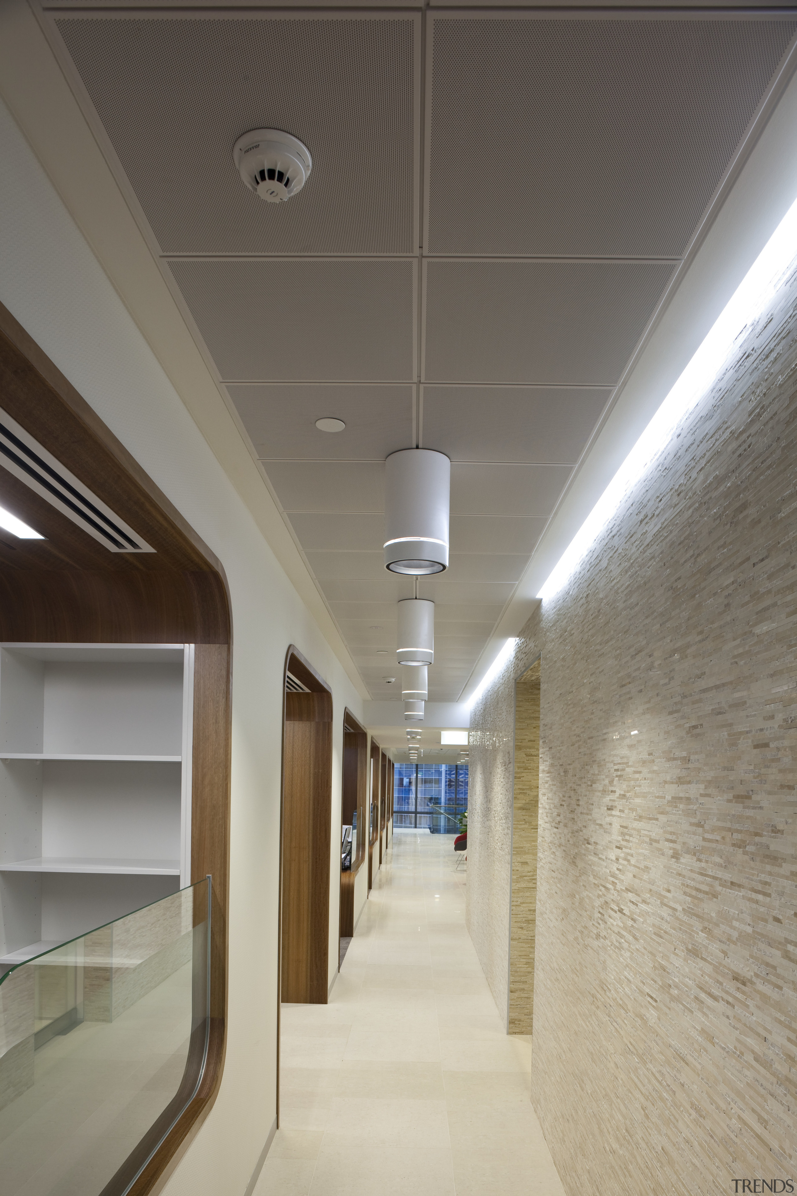 View of light-toned hallway with hanging lamps. - architecture, ceiling, daylighting, interior design, lighting, gray