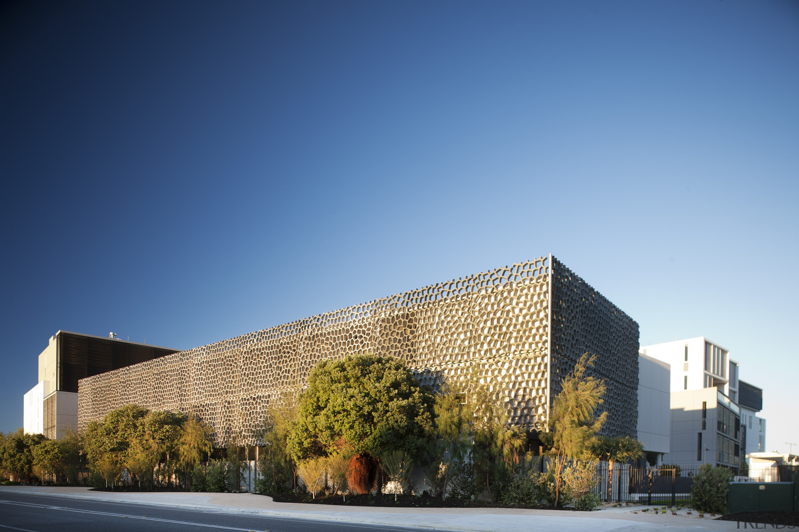 This precinct was developed by Mirvac. Here is architecture, building, commercial building, corporate headquarters, daytime, facade, headquarters, home, house, mixed use, real estate, residential area, sky, blue, teal