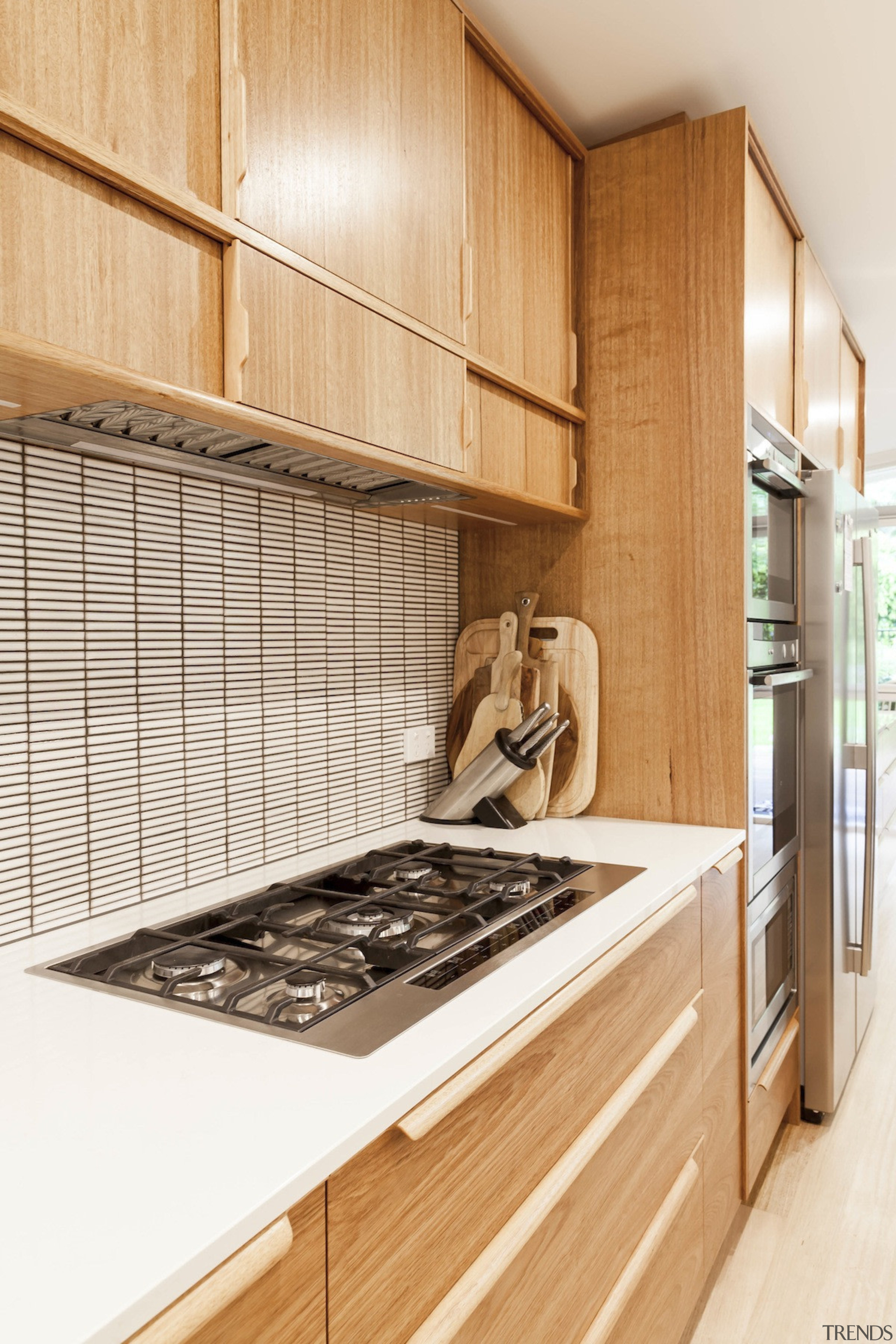 Wood cabinetry gives the kitchen a sustainable look cabinetry, countertop, cuisine classique, interior design, kitchen, room, white, orange