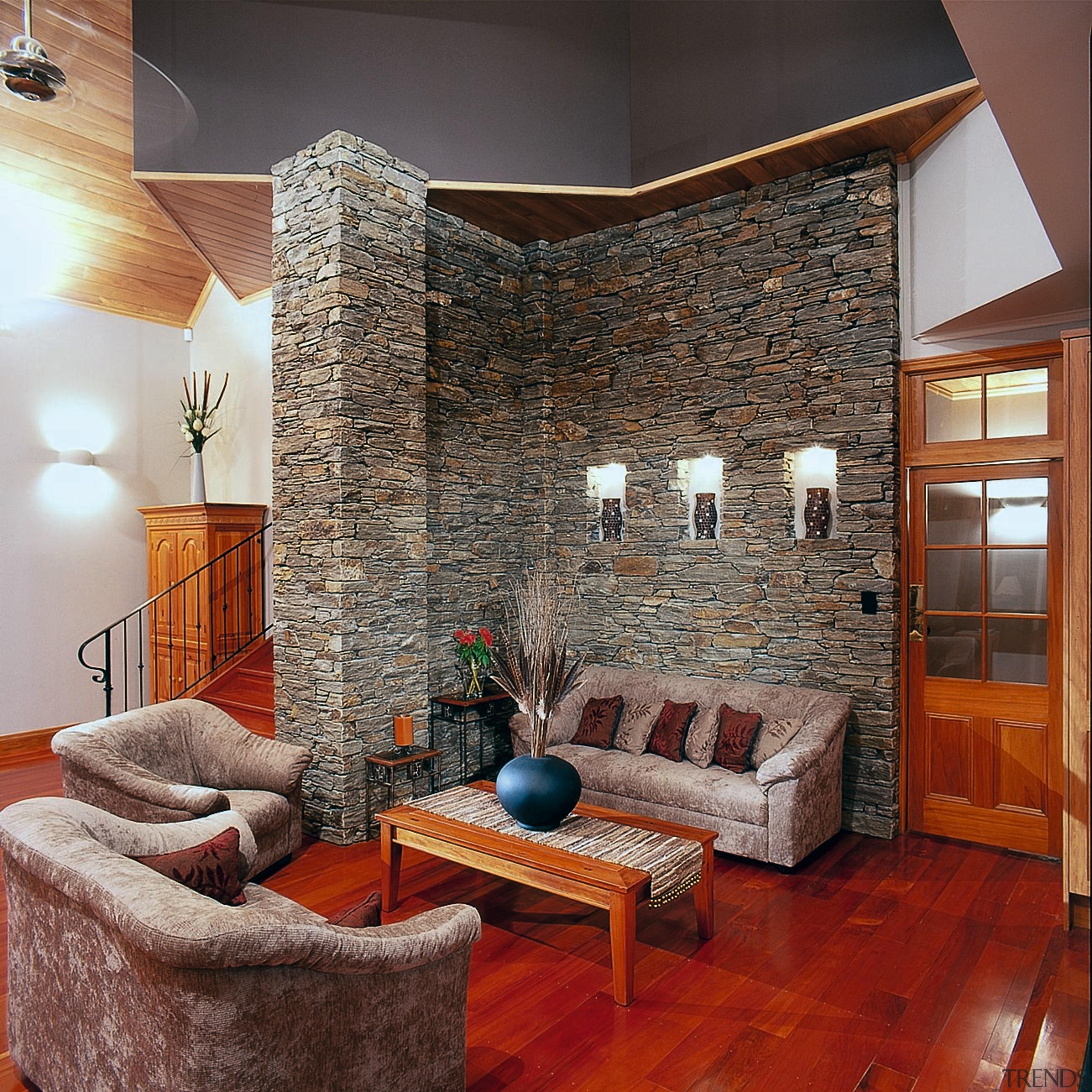 View of the informal living area, features an interior design, living room, room, wall, red