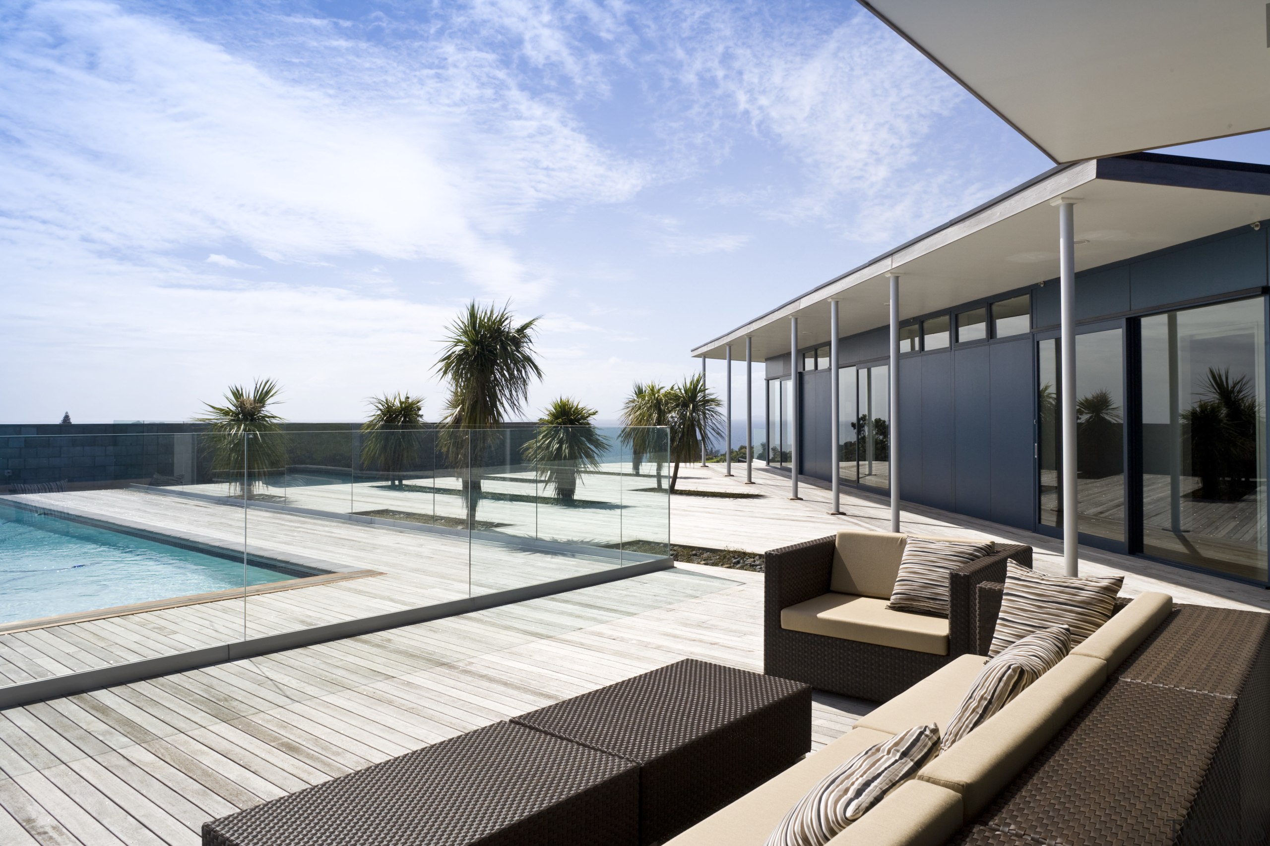 Image of the exterior of this beautifully designed apartment, architecture, condominium, estate, house, leisure, leisure centre, penthouse apartment, property, real estate, resort, swimming pool, white