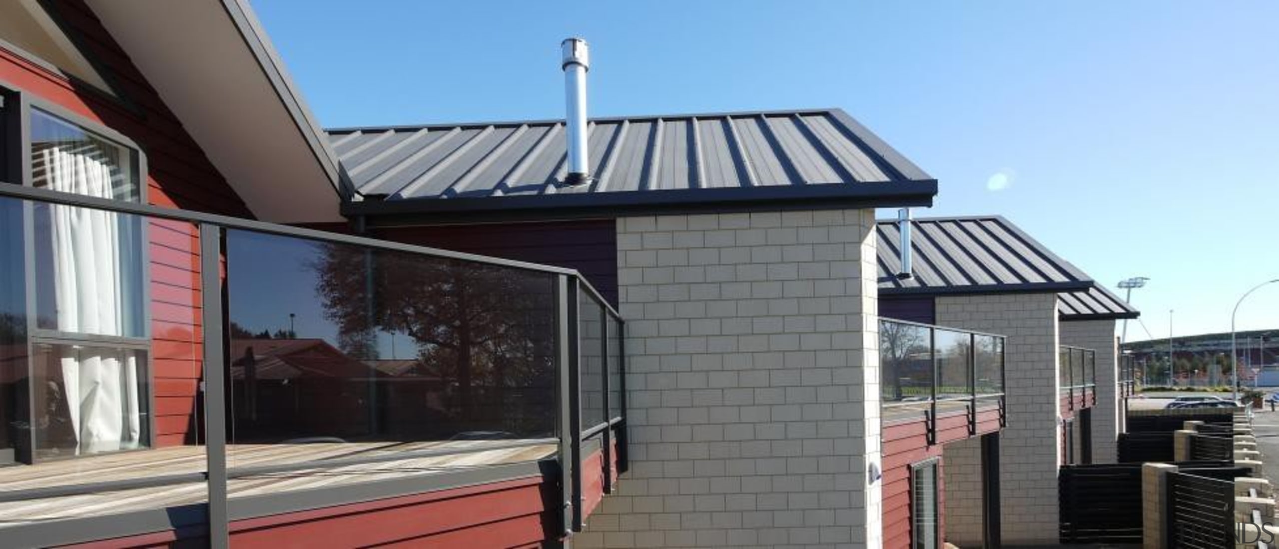 Multi unit design by Design House Architecture - building, daylighting, facade, house, property, real estate, roof, siding, structure, window, gray