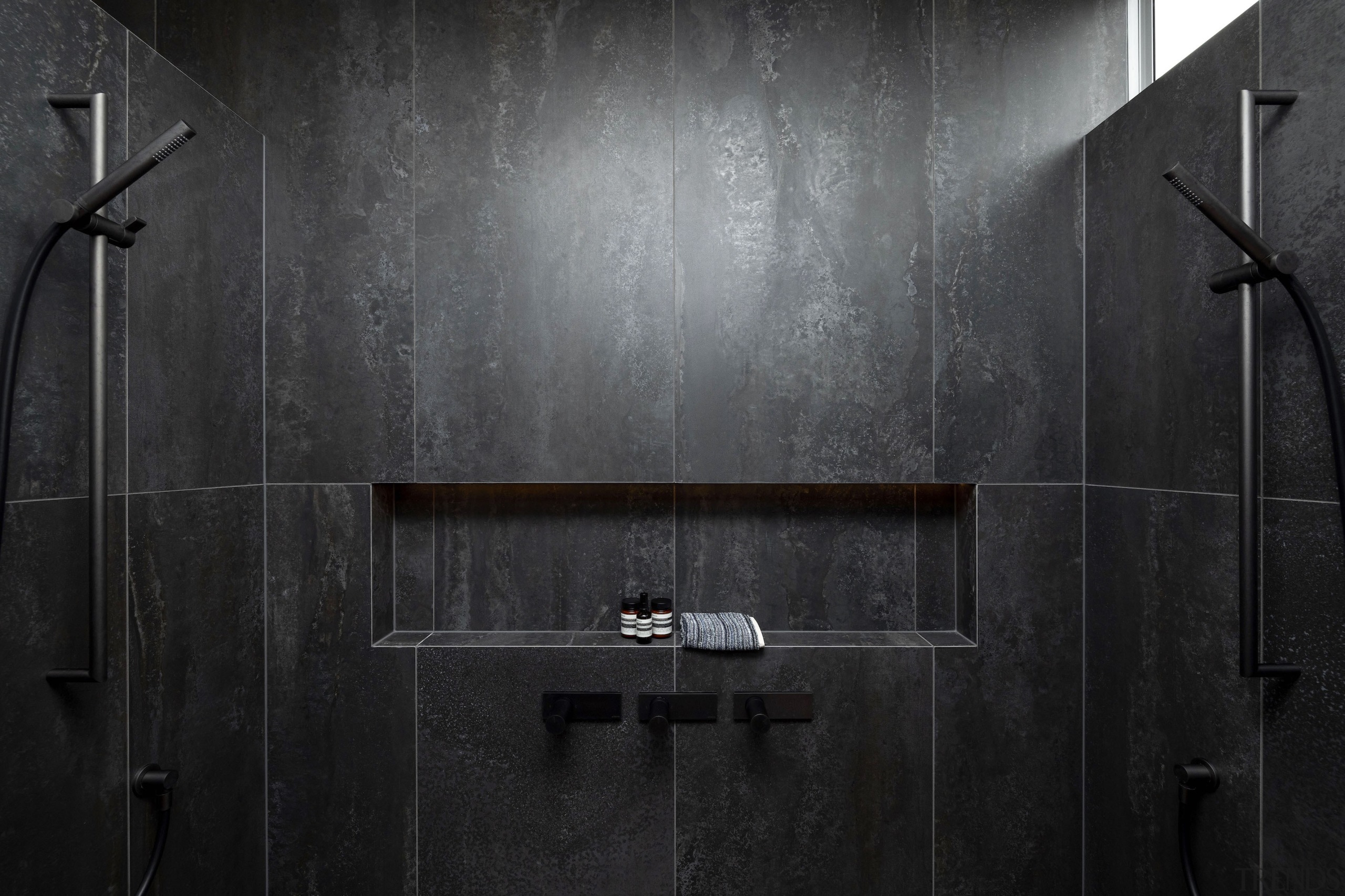 Even the shower has a moody, glamorous air. 