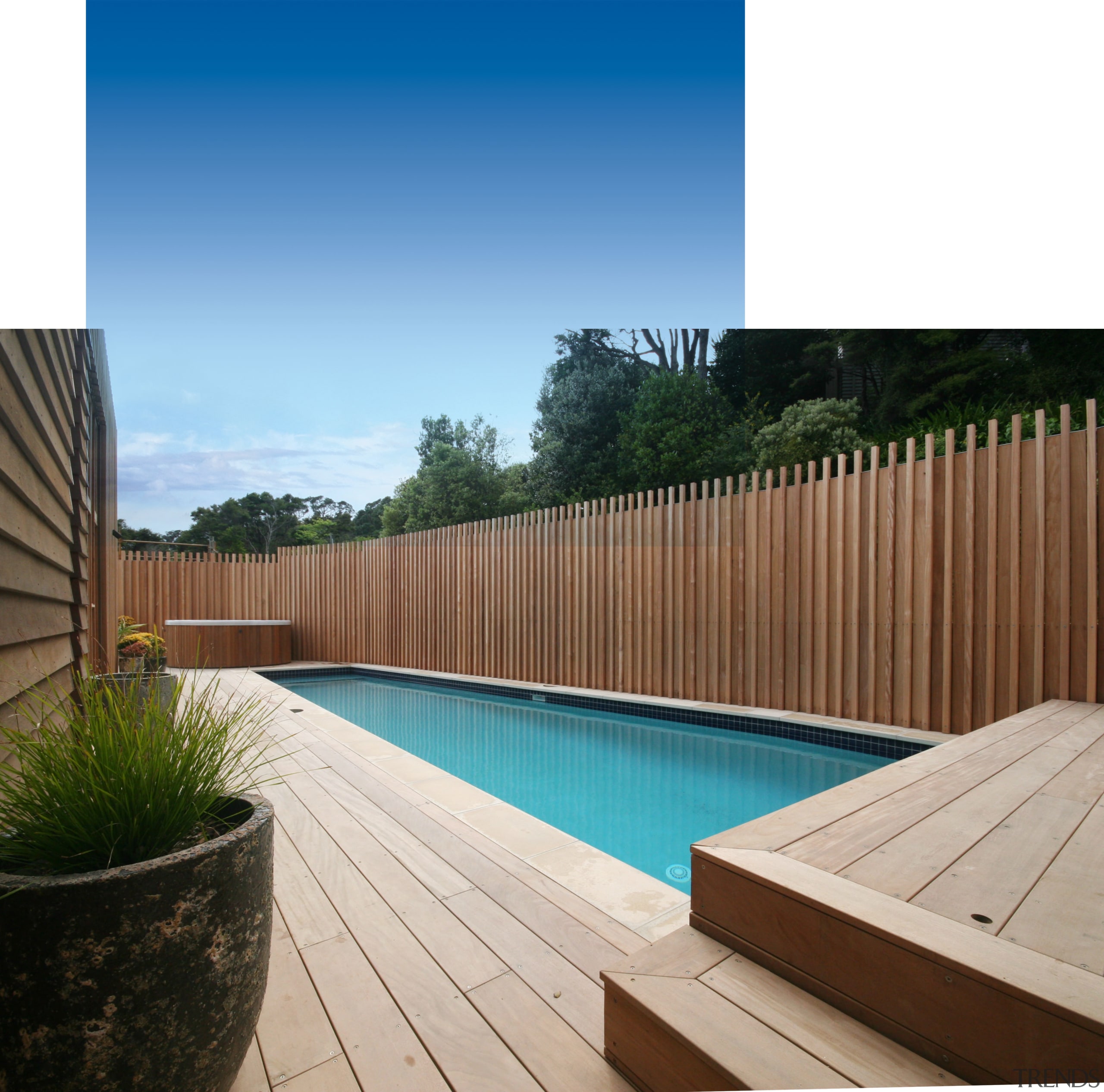 Executive Pools creates durable, aesthetically pleasing steel-reinforced concrete backyard, deck, fence, hardwood, leisure, outdoor furniture, outdoor structure, property, real estate, swimming pool, wood, wood stain, white