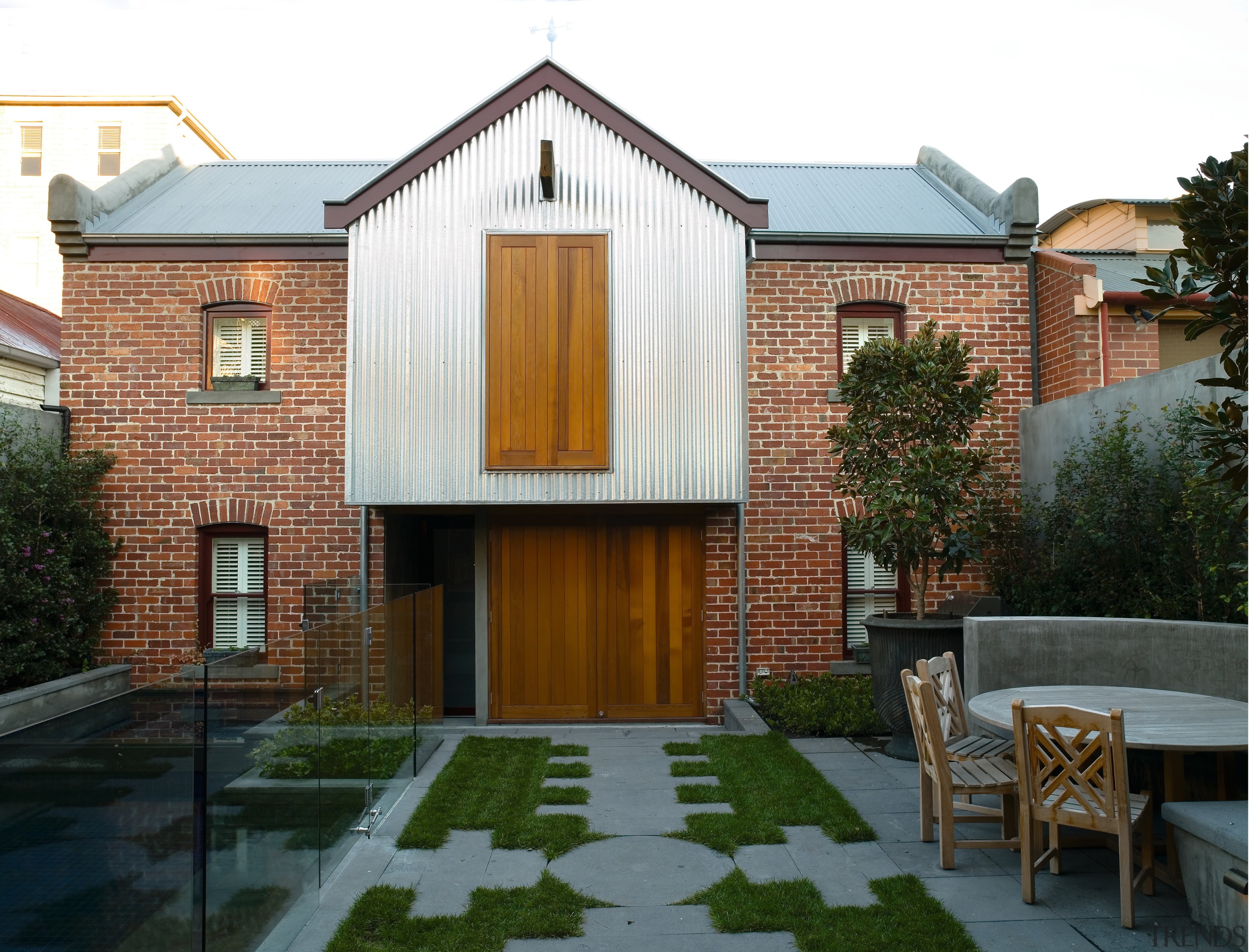 An exterior view of the patio area. - architecture, building, cottage, estate, facade, home, house, property, real estate, residential area, roof, shed, siding, window, brown, white