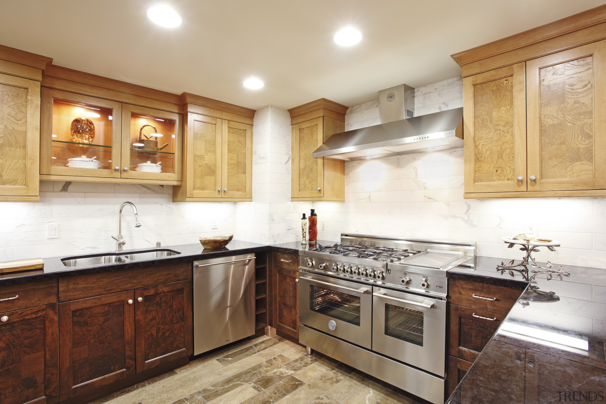 View of a contemporary kitchen which features a cabinetry, countertop, cuisine classique, floor, flooring, hardwood, home, interior design, kitchen, property, real estate, room, wood flooring, white, orange