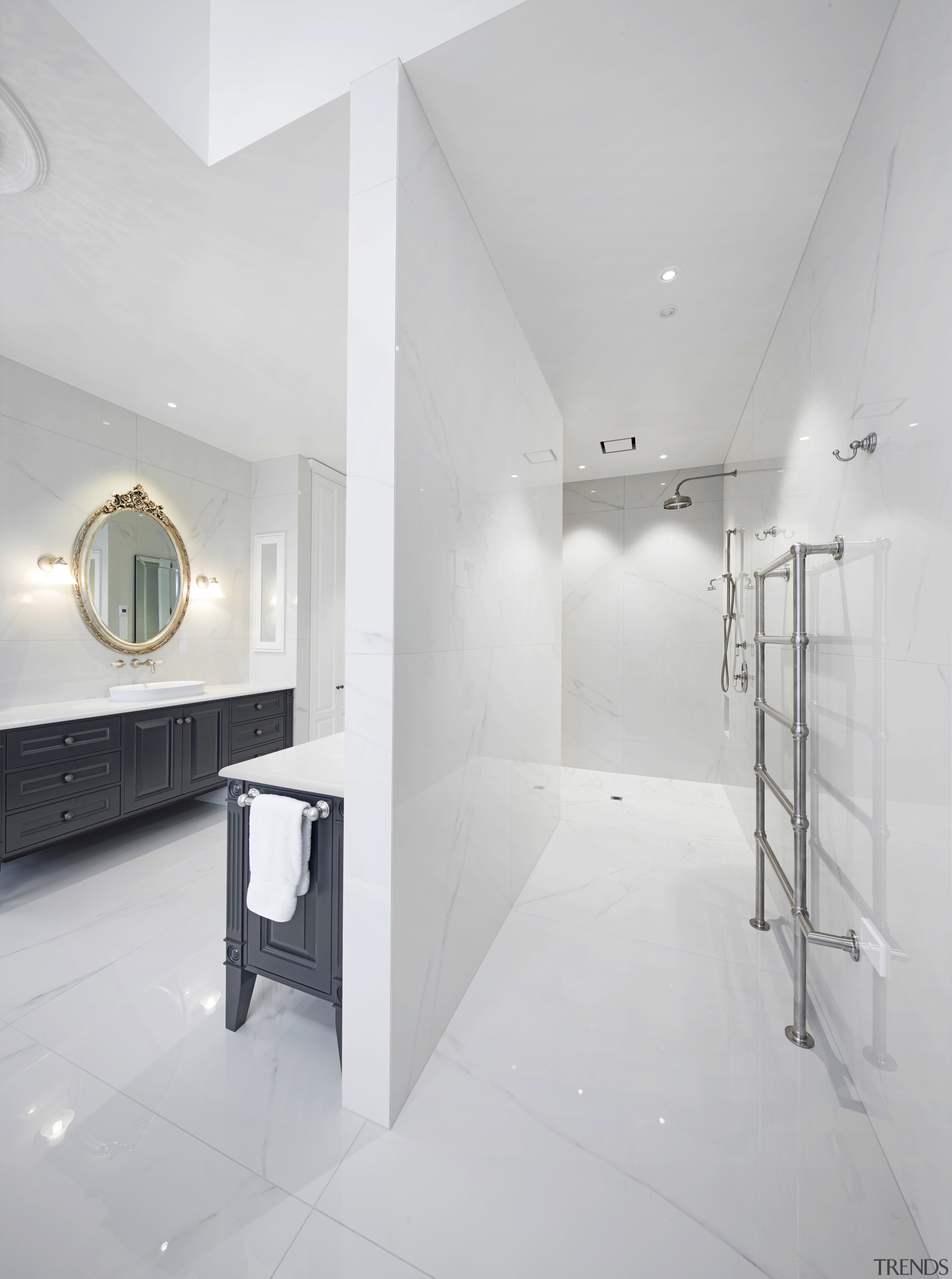 ​​​​​​​This shower area is L-shaped, with the shower architecture, bathroom, design, floor, flooring, tile, wall, white, gray, rain showerhead, Ingrid Geldof, vanity wall