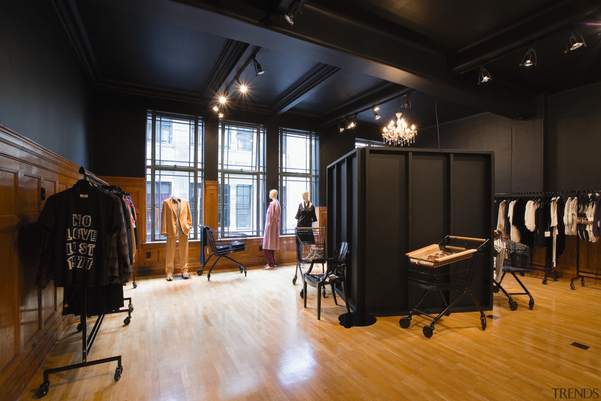 A view of a store, wooden flooring. - ceiling, floor, flooring, furniture, interior design, wood, black