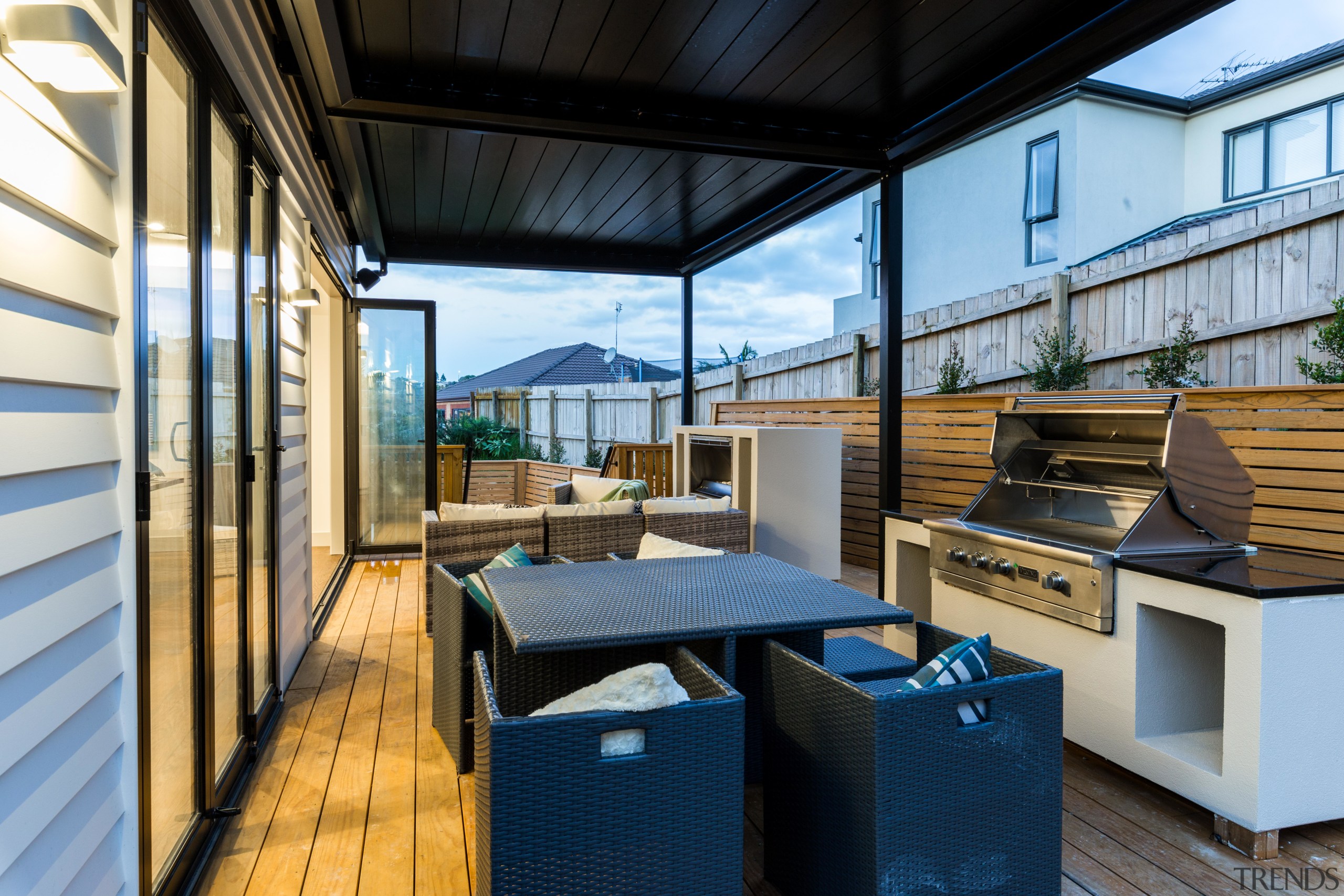 ​​​​​​​An outdoor Rinnai fire and barbecue feature on house, outdoor,  Rinnai Fire,  Barbecue,  Chancellor Construction, deck, pergola