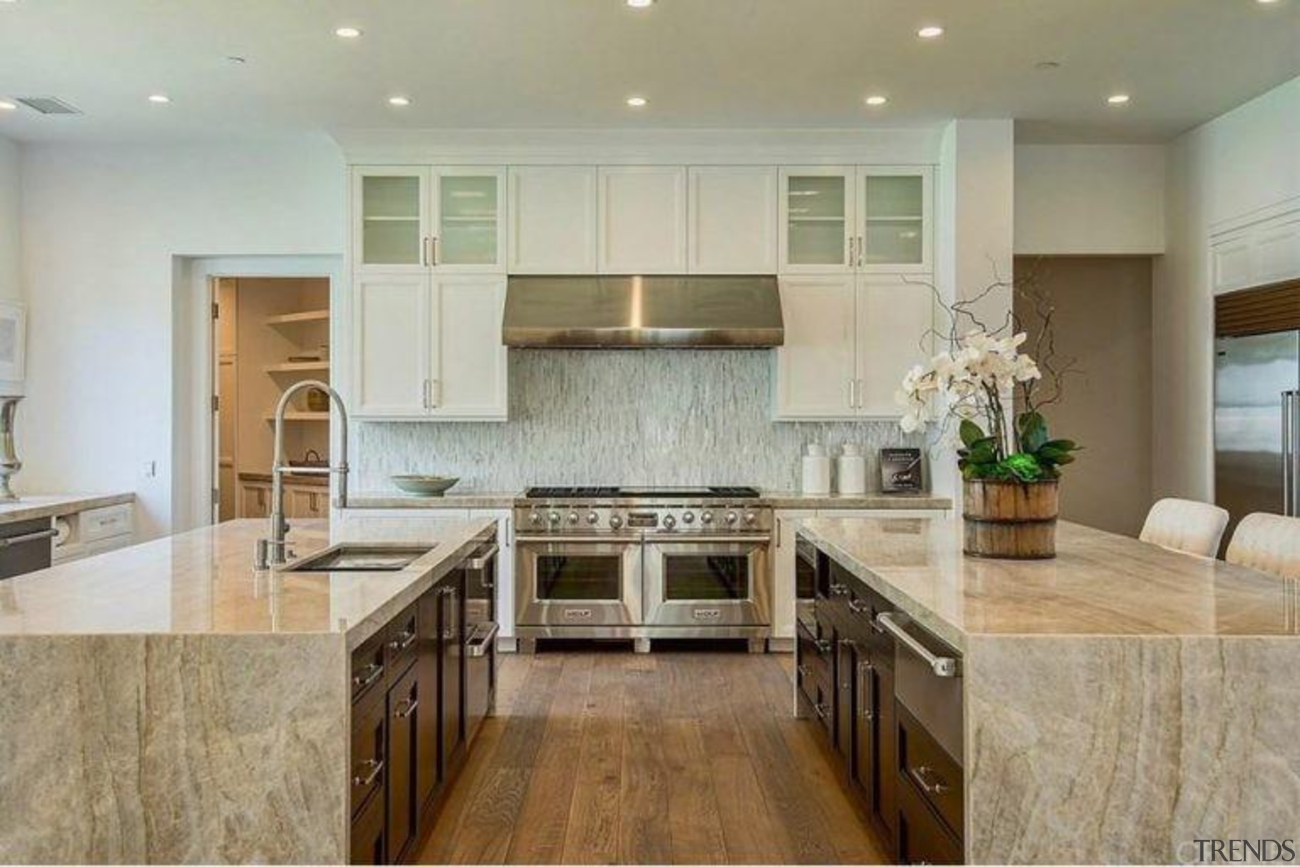 The Weeknd’s massive US$19.995 million mansion - The cabinetry, ceiling, countertop, cuisine classique, floor, flooring, hardwood, interior design, kitchen, laminate flooring, property, real estate, room, tile, wood flooring, gray, brown