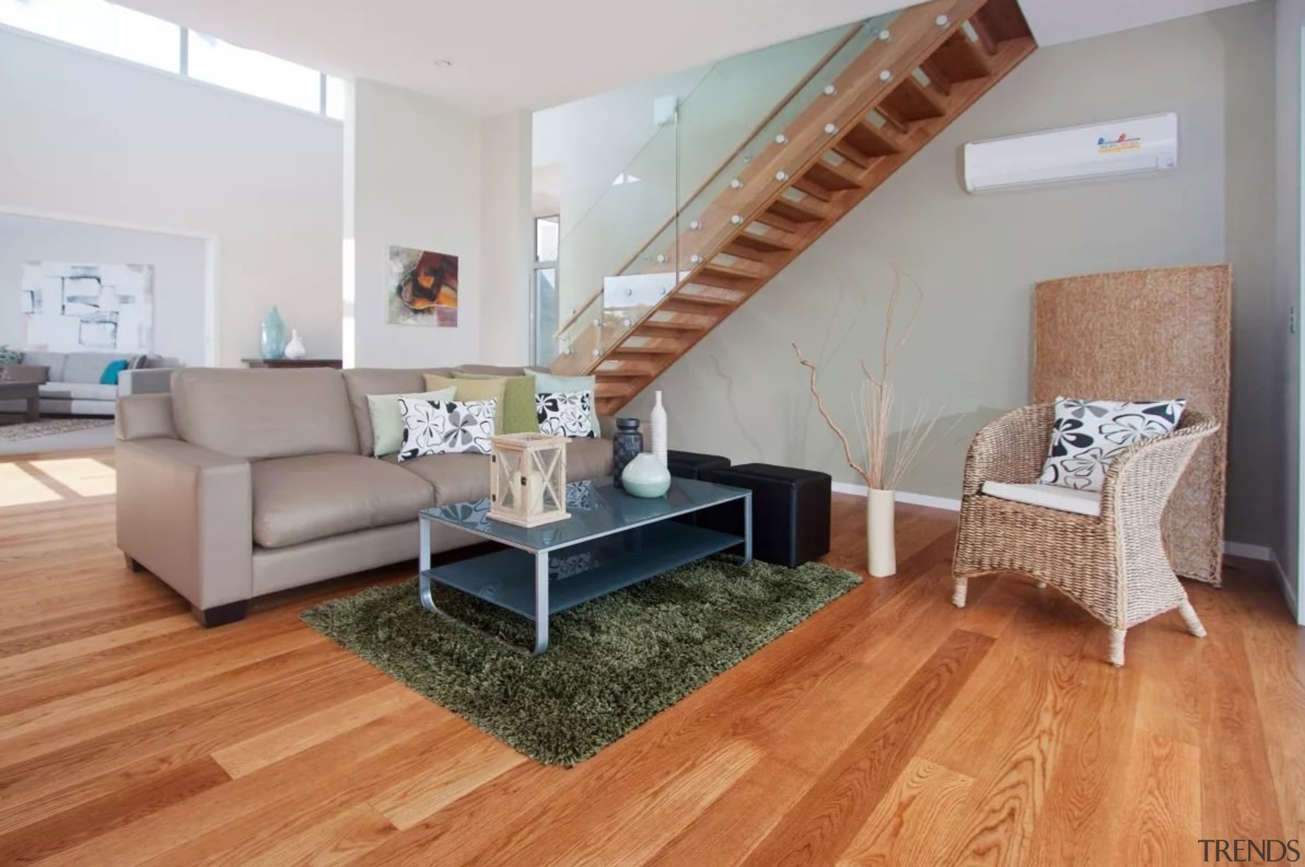 View the home floor, flooring, furniture, hardwood, home, interior design, laminate flooring, living room, property, real estate, room, wall, wood, wood flooring, gray