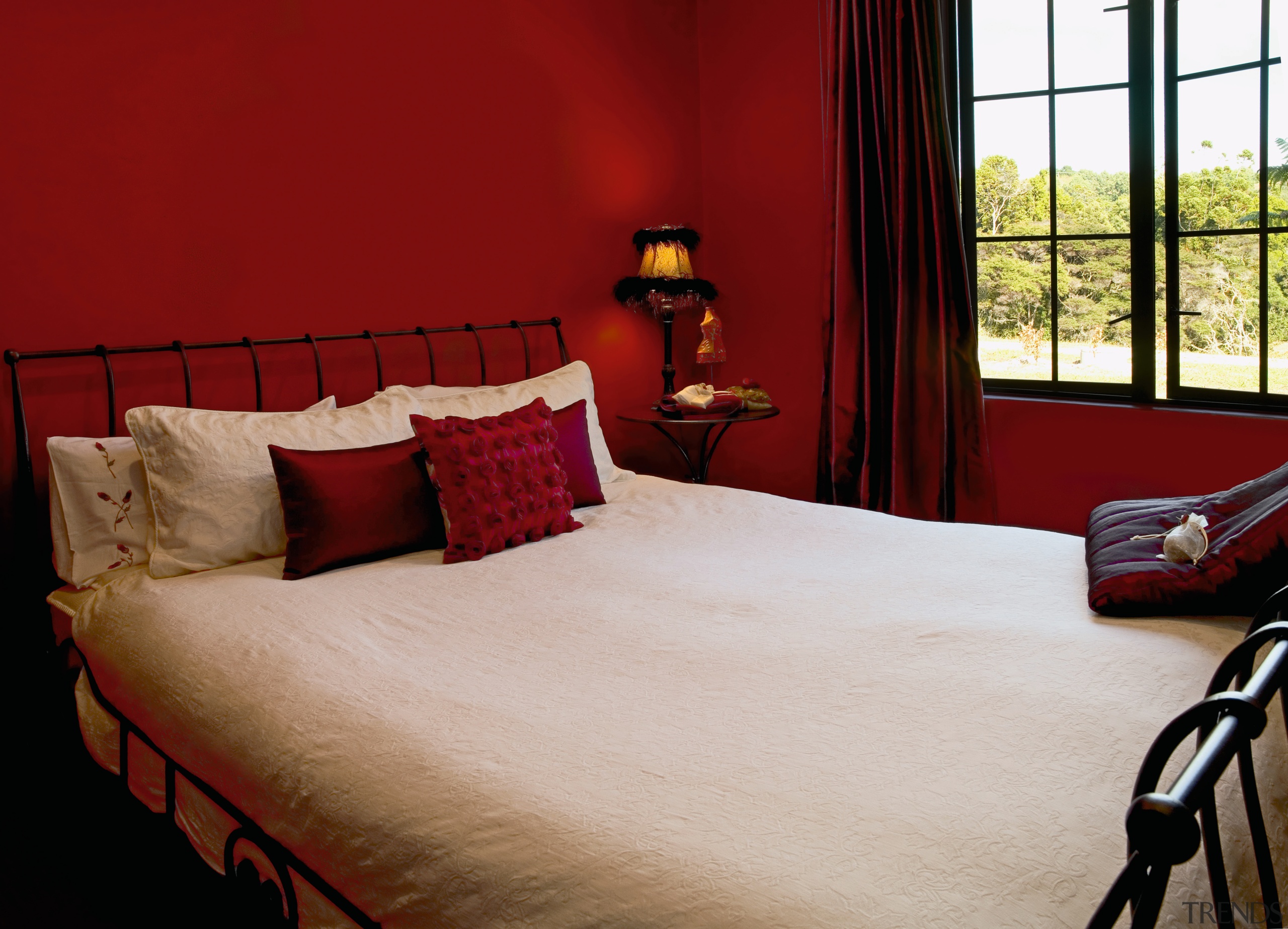 view of the bedroom painted in resene persian bed, bed frame, bed sheet, bedroom, furniture, home, interior design, room, suite, red