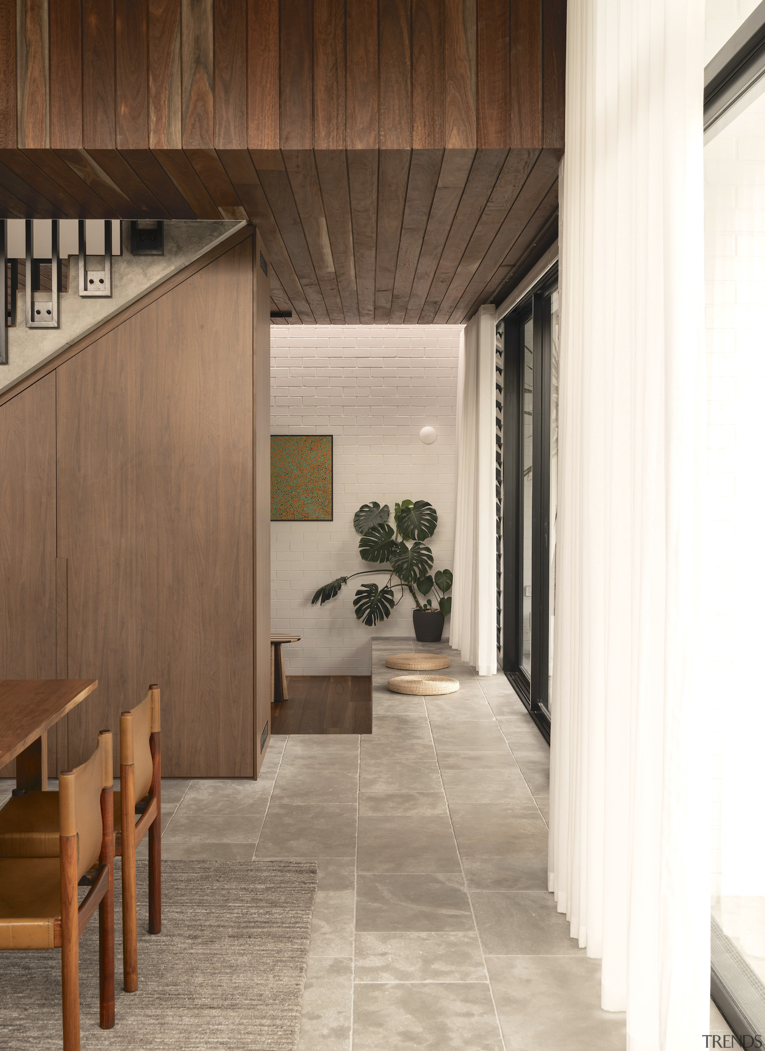 Looking past stair to sunken lounge. - Relaxed 