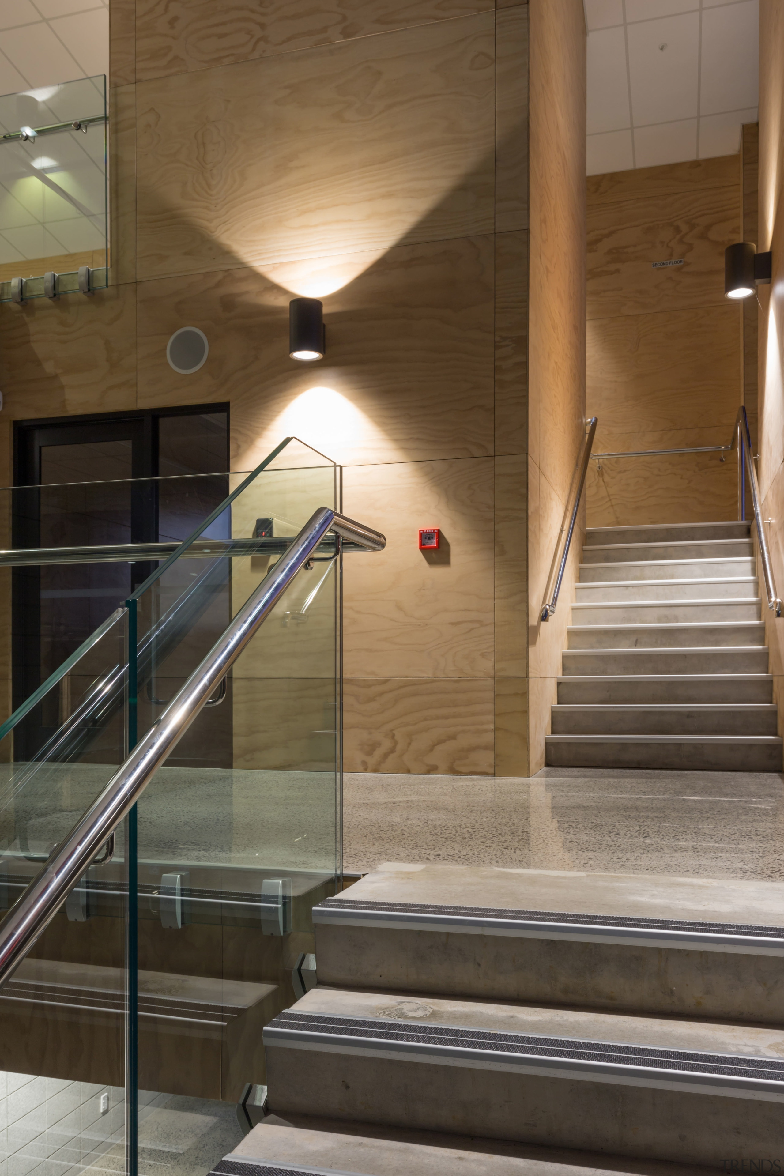 The entry foyer in the new ACG Gymnasium architecture, daylighting, floor, glass, handrail, interior design, lobby, stairs, brown, black, gray