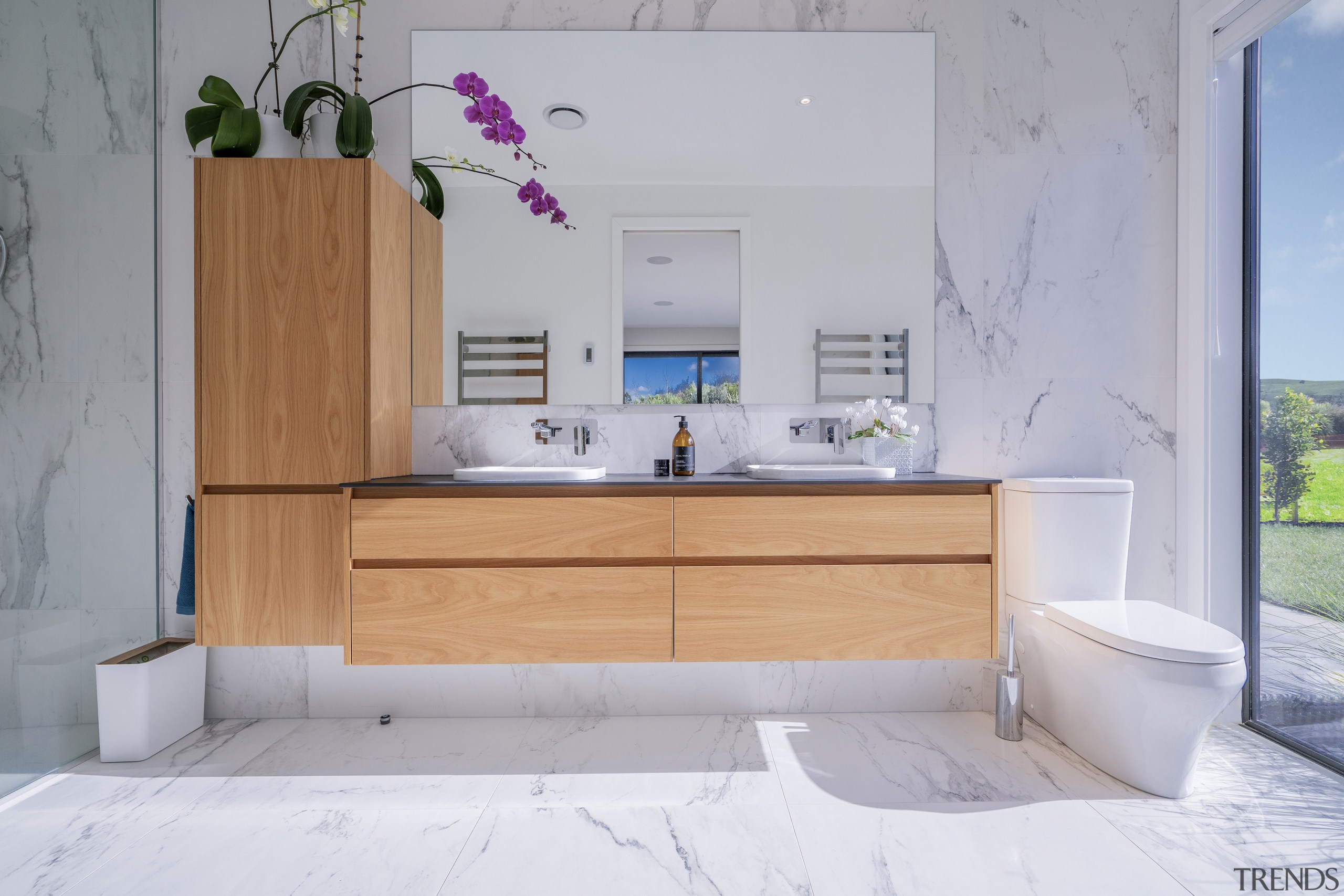 Marble look surfaces combine with the warmth of 