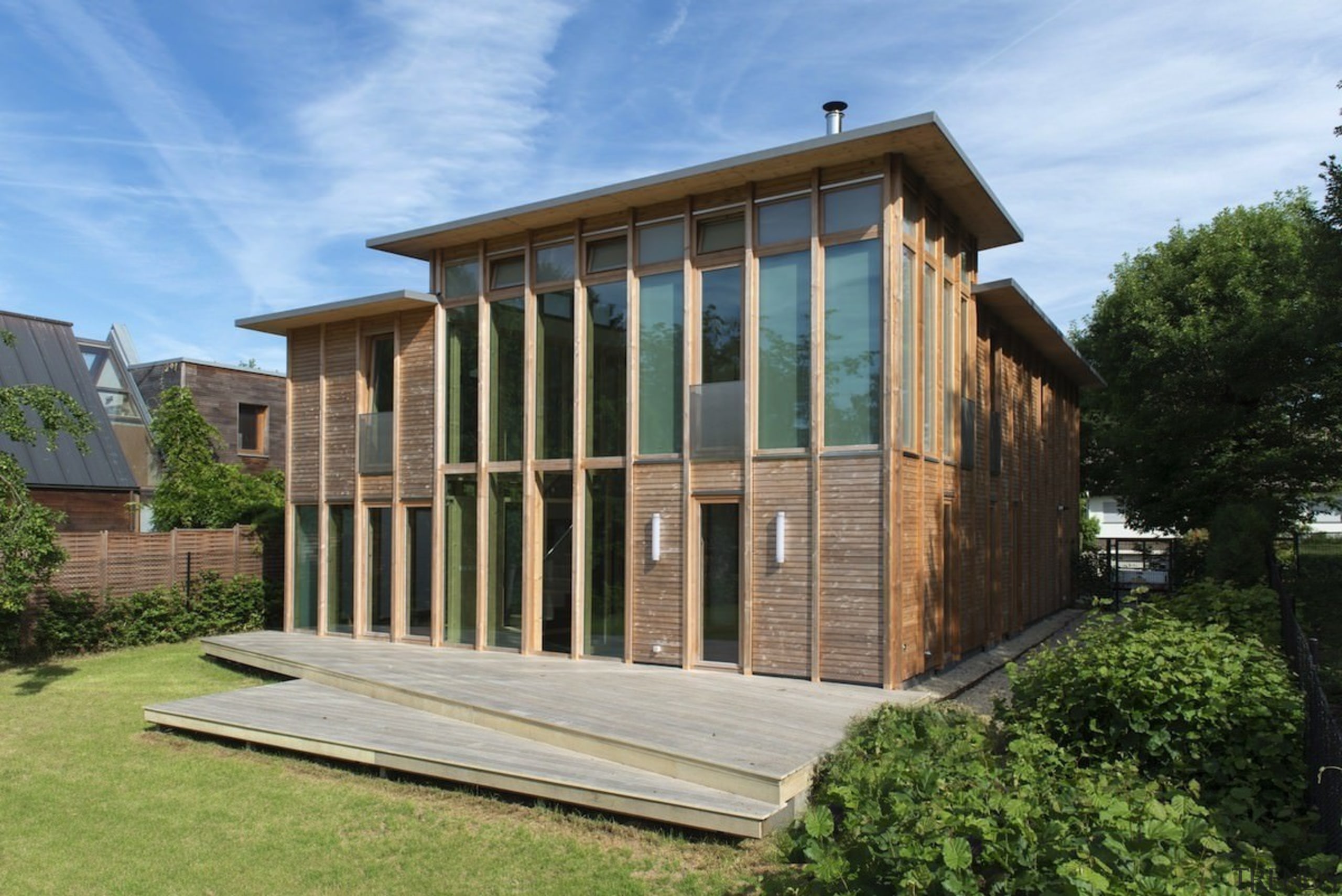 The home is well-suited for outdoor entertaining - cottage, facade, home, house, property, real estate, shed, siding, teal