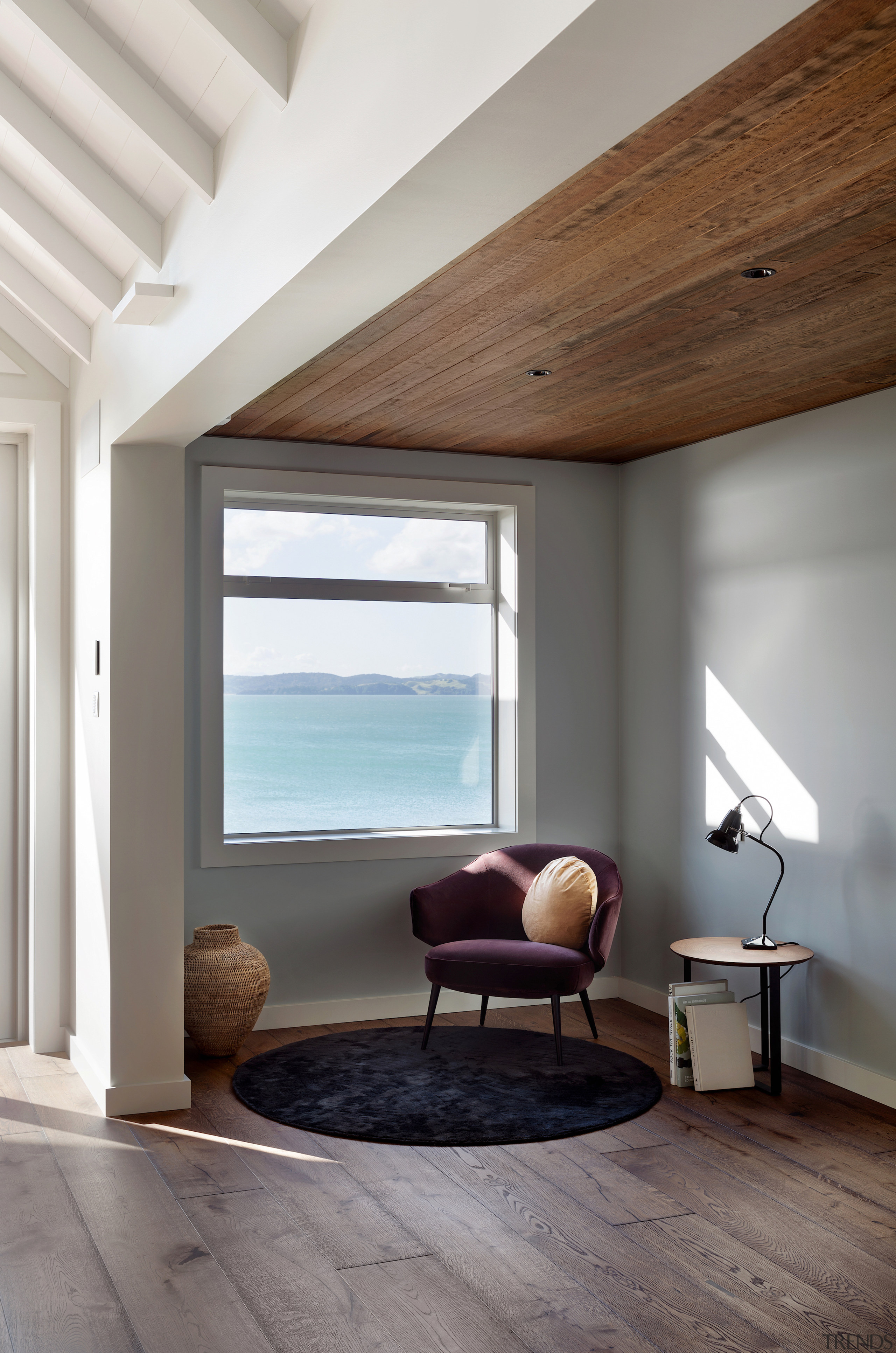 A feature timber ceiling echoes the floorboards in 