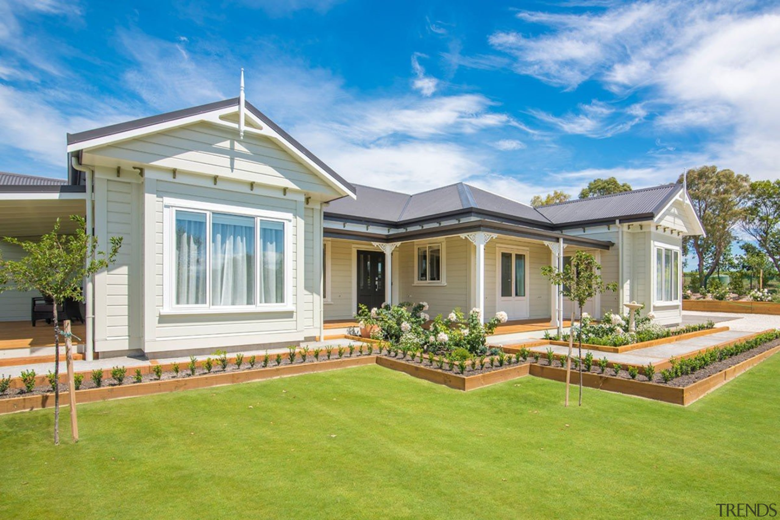 The first view of a David Wraight home backyard, cottage, elevation, estate, facade, farmhouse, home, house, lawn, mansion, property, real estate, residential area, siding, villa, window, yard