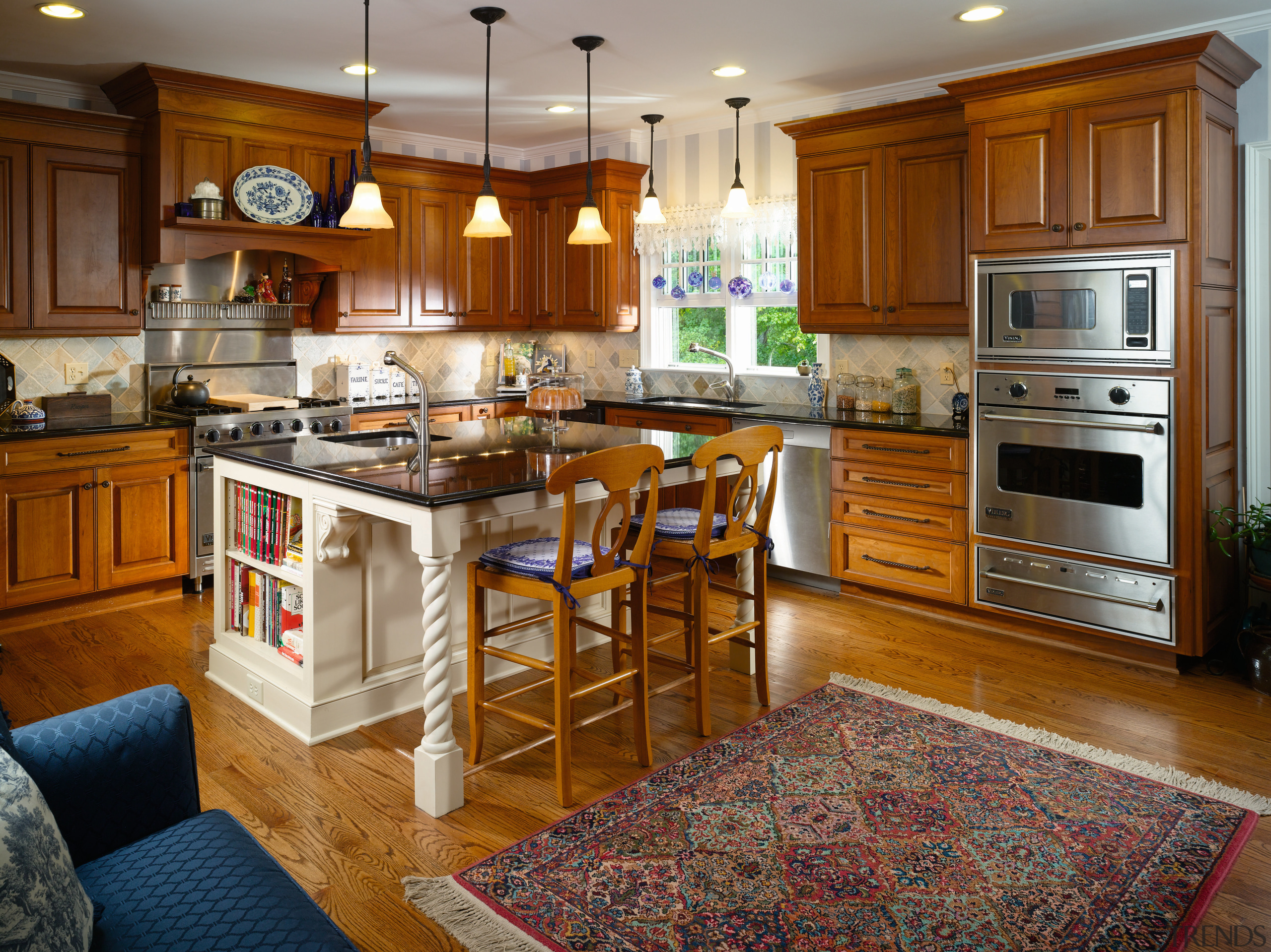 Image of a kitchen with a traditional design cabinetry, countertop, cuisine classique, floor, flooring, hardwood, home, interior design, kitchen, real estate, room, wood flooring, brown