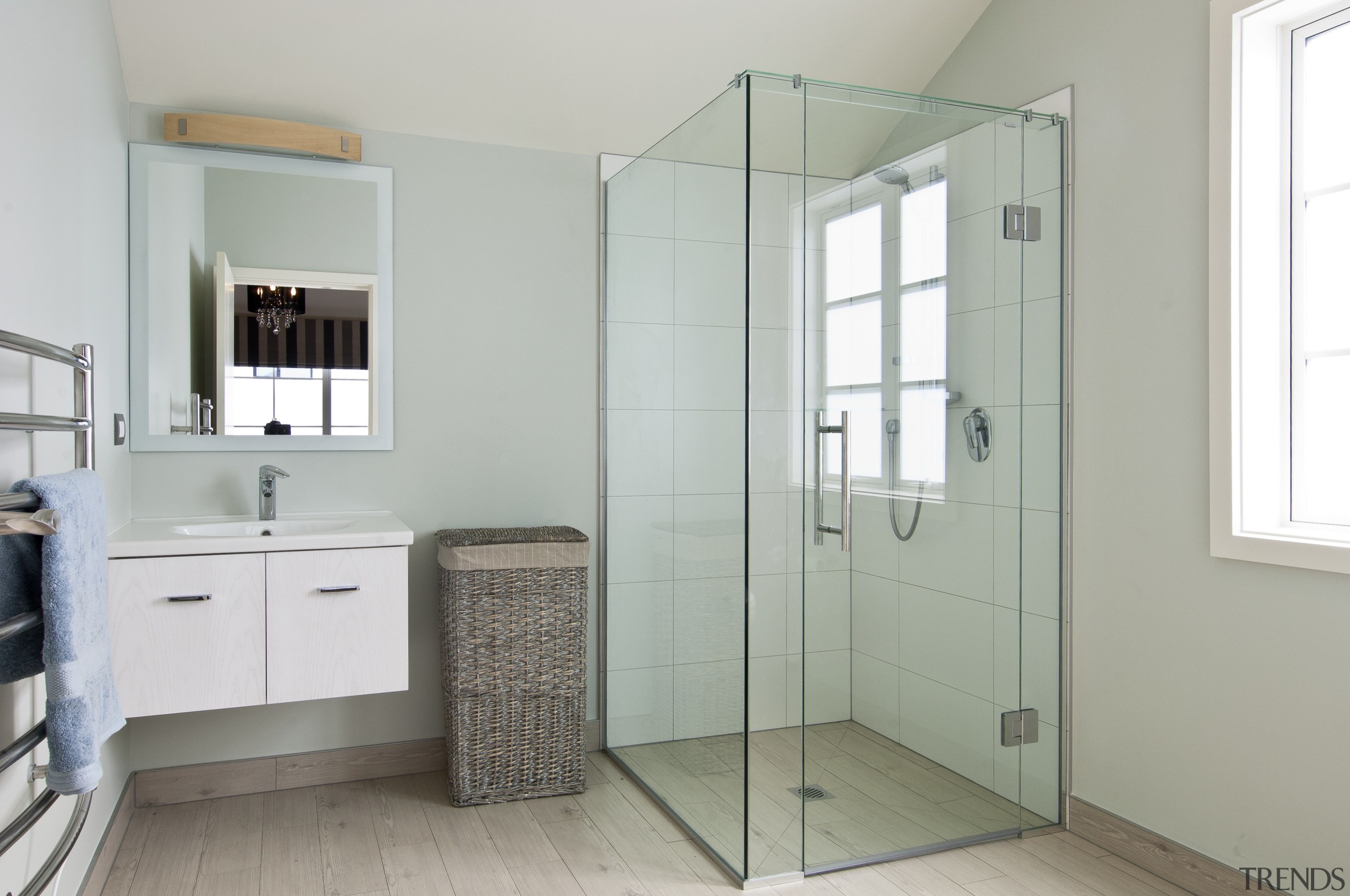 bathroom vanity, mirror, shower, towel rail of bedroom bathroom, bathroom accessory, bathroom cabinet, floor, home, interior design, plumbing fixture, product, room, gray