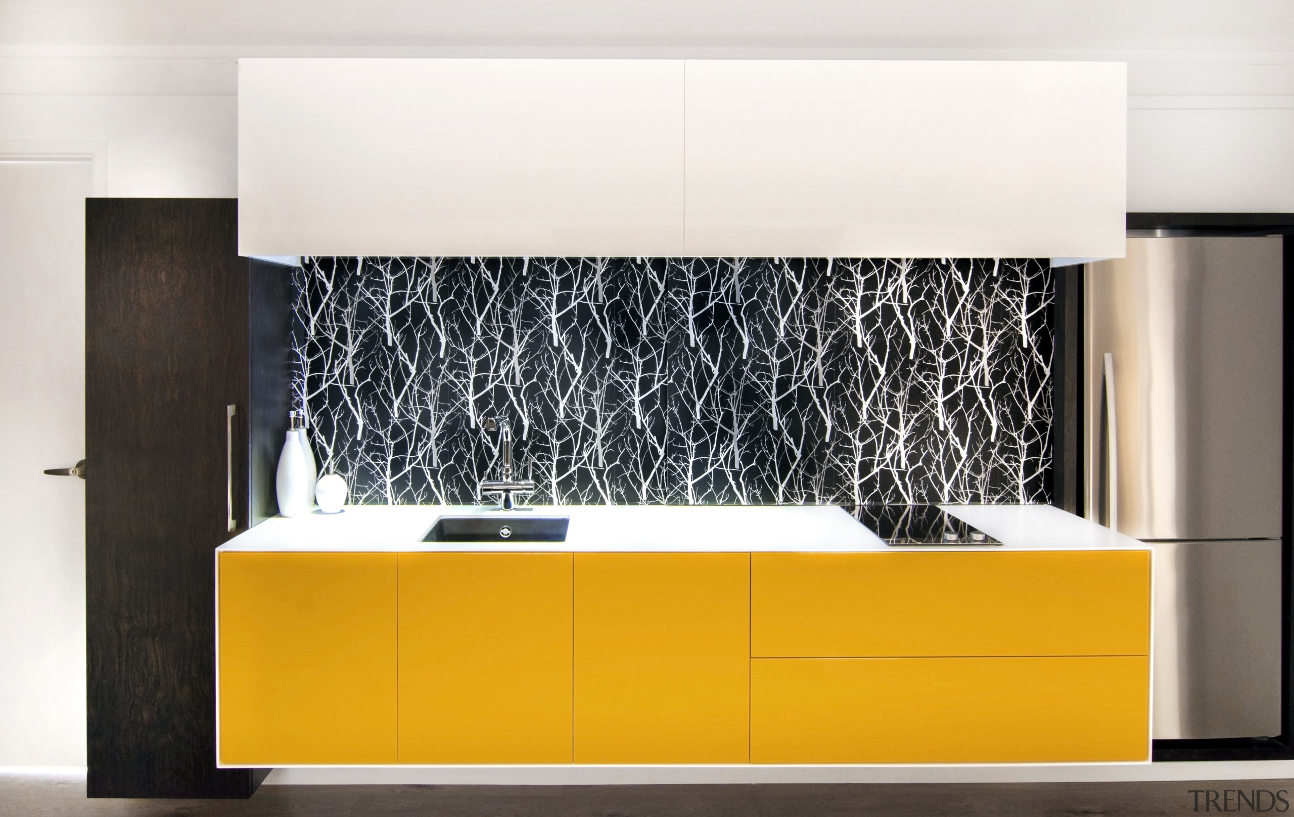 The yellow on this cantilevered cabinet is teamed floor, flooring, furniture, interior design, product design, wall, white