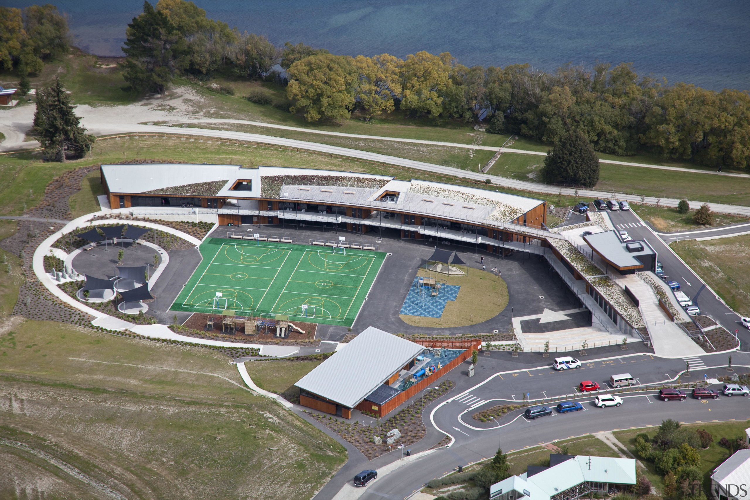 View of Remarkables Primary School in Queenstown. - aerial photography, bird's eye view, sport venue, structure, brown, gray