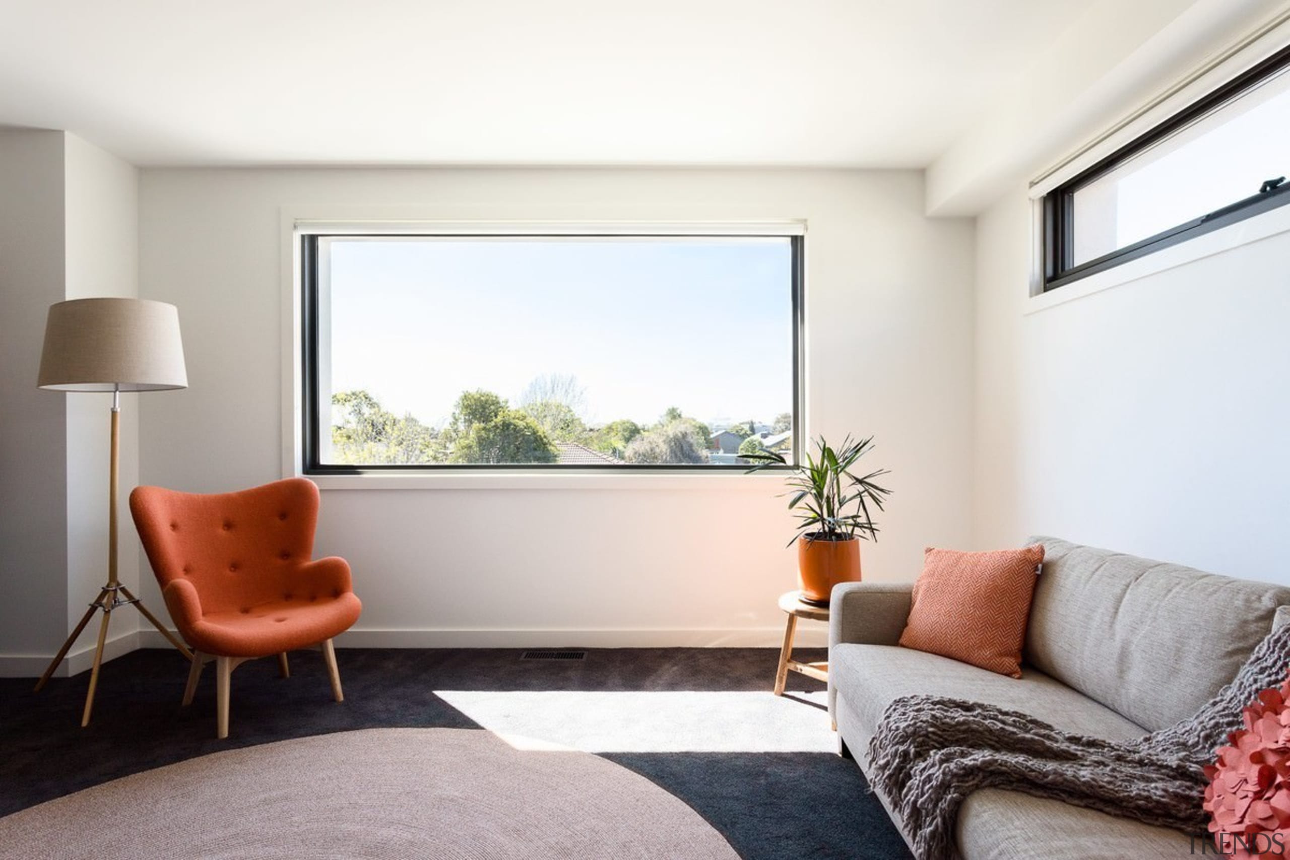 A single large window provides a view, while home, house, interior design, living room, property, real estate, room, window, white