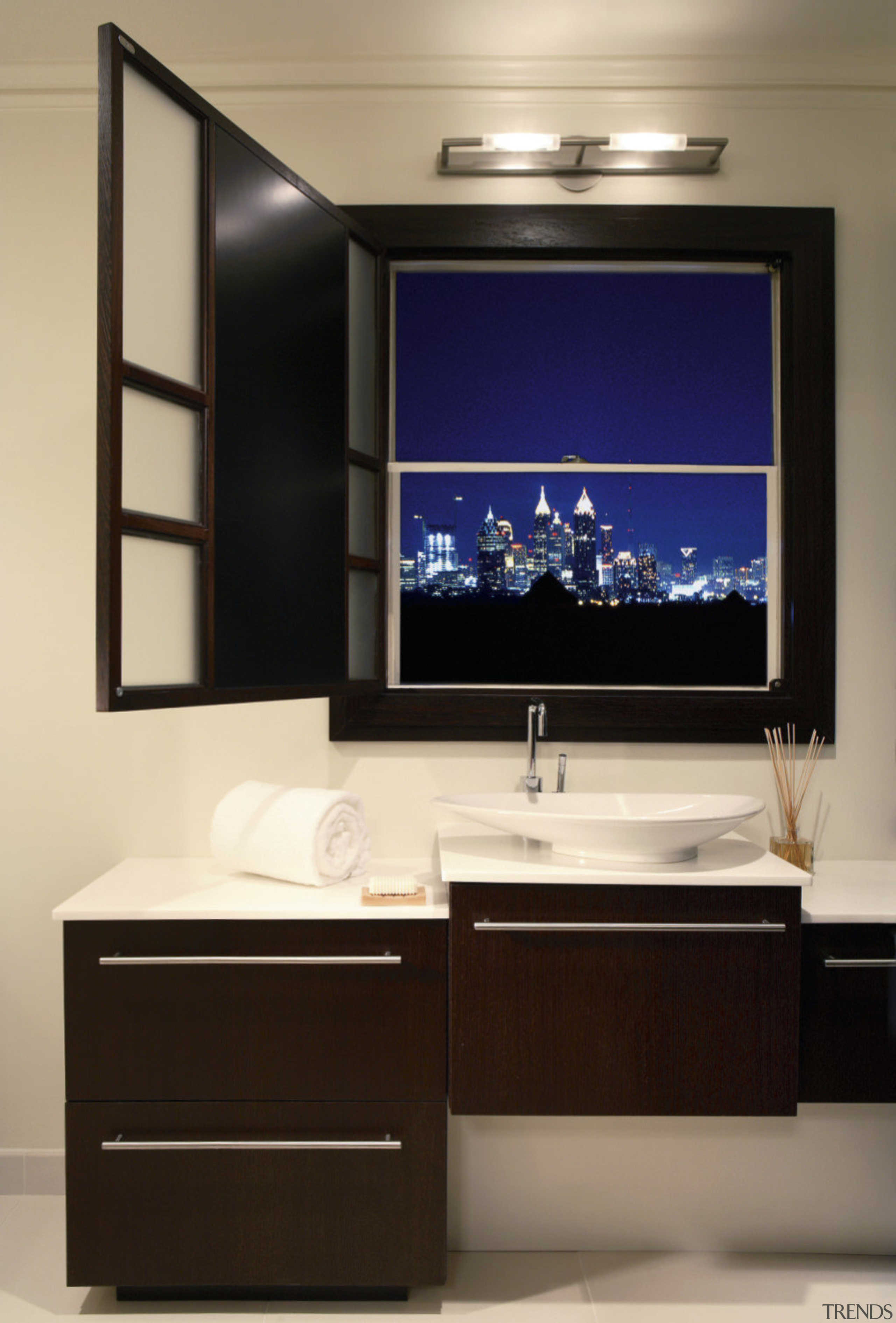 Image of a bathroom designed by an NKBA bathroom, bathroom accessory, bathroom cabinet, display device, flat panel display, furniture, interior design, multimedia, room, sink, orange, black