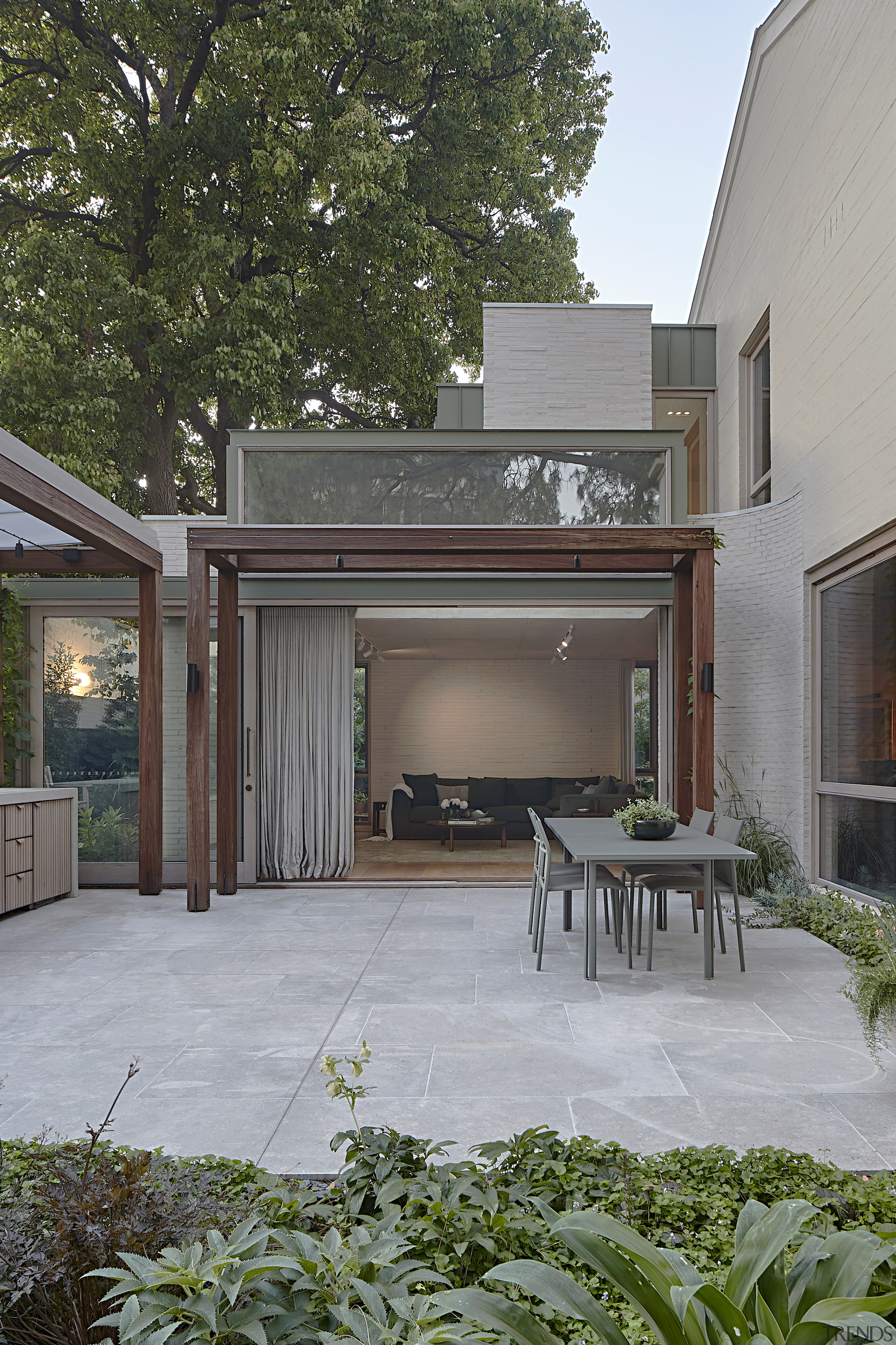 The central courtyard created by the L-shaped plan. 